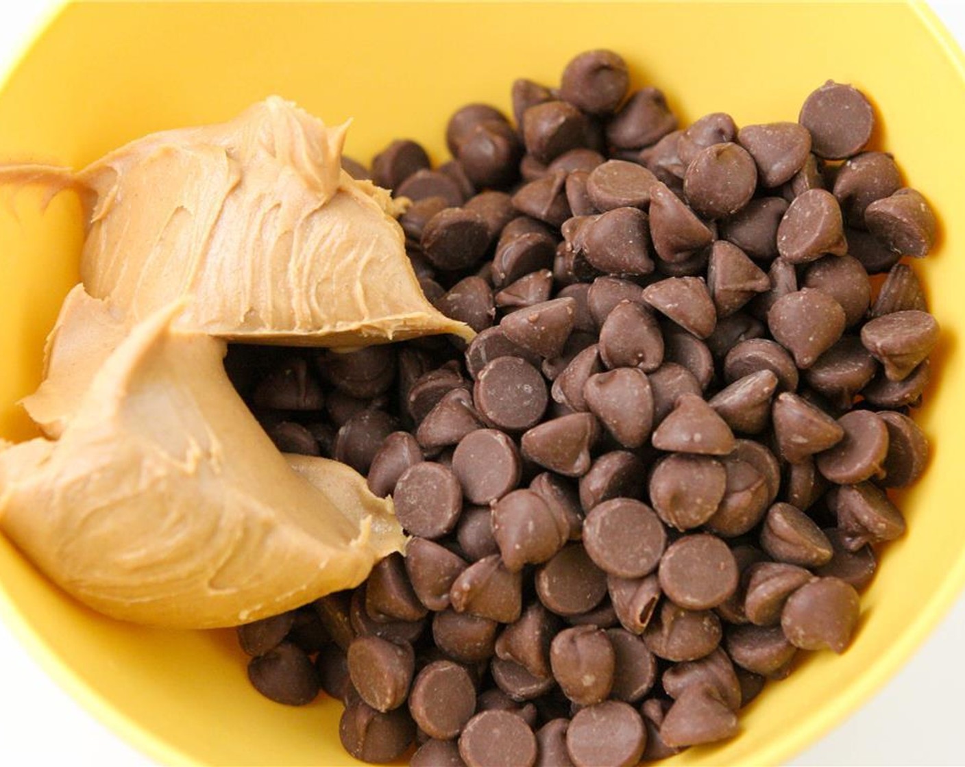 step 2 In a small bowl, combine Milk Chocolate Chips (1 cup) and Creamy Peanut Butter (1/4 cup).