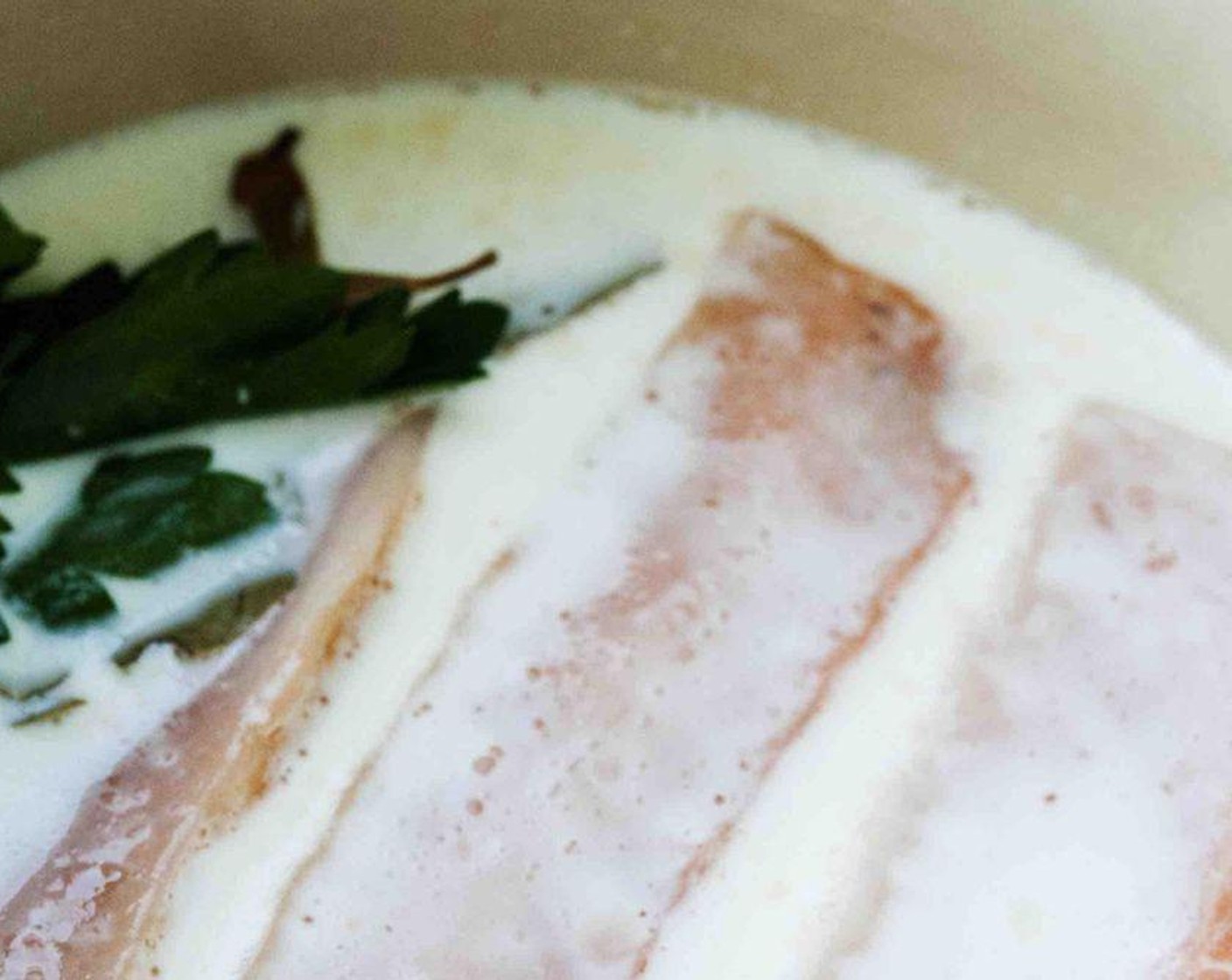 step 1 Bring Whole Milk (1 1/4 cups) and Bay Leaves (2) to a simmer, add Skinless Salmon Fillets (9 oz) and poach it for about 10 minutes or until tender.