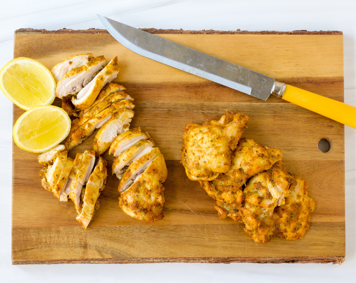 step 7 To serve, slice the chicken against the grain. Spritz the juice from the Lemon (1) over the chicken. Drizzle the tahini sauce over the chicken and cauliflower and serve immediately. Enjoy with Pita Bread (to taste) if preferred.