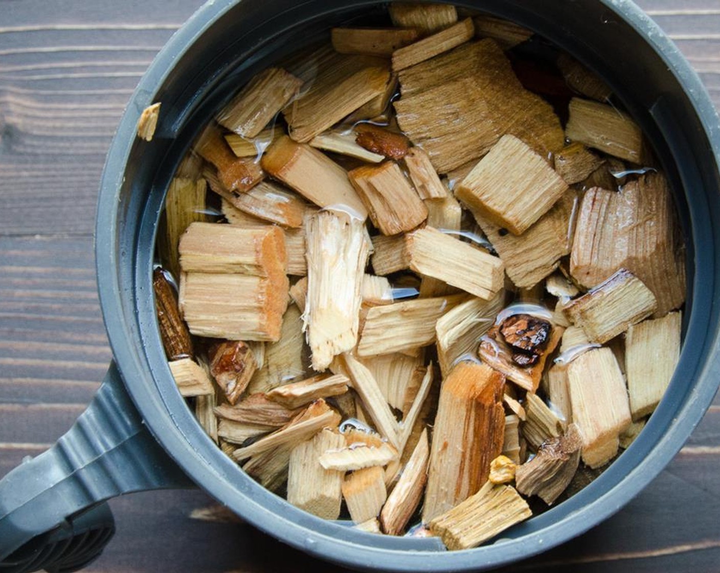 step 3 The next day, soak the hickory wood chips in a bowl filled with water for an hour.