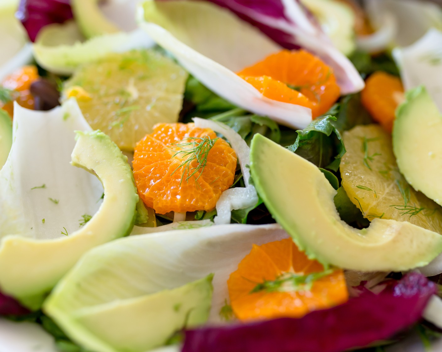step 1 Assemble salad by adding Salad Greens (4 cups), Endive (1 cup), Radicchio (1 cup), Navel Orange (1), Mandarin Orange (1), Fennel Bulb (1 stalk), and Avocado (1) onto a platter.
