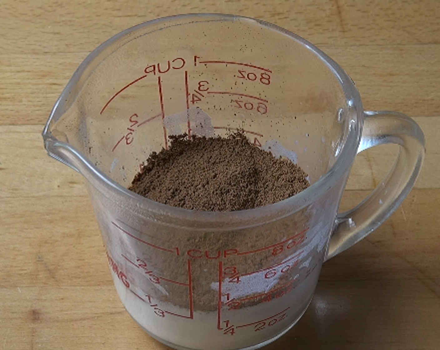 step 4 Heat Milk (1/4 cup) in microwave until hot and add Instant Coffee (2 Tbsp). Mix together.