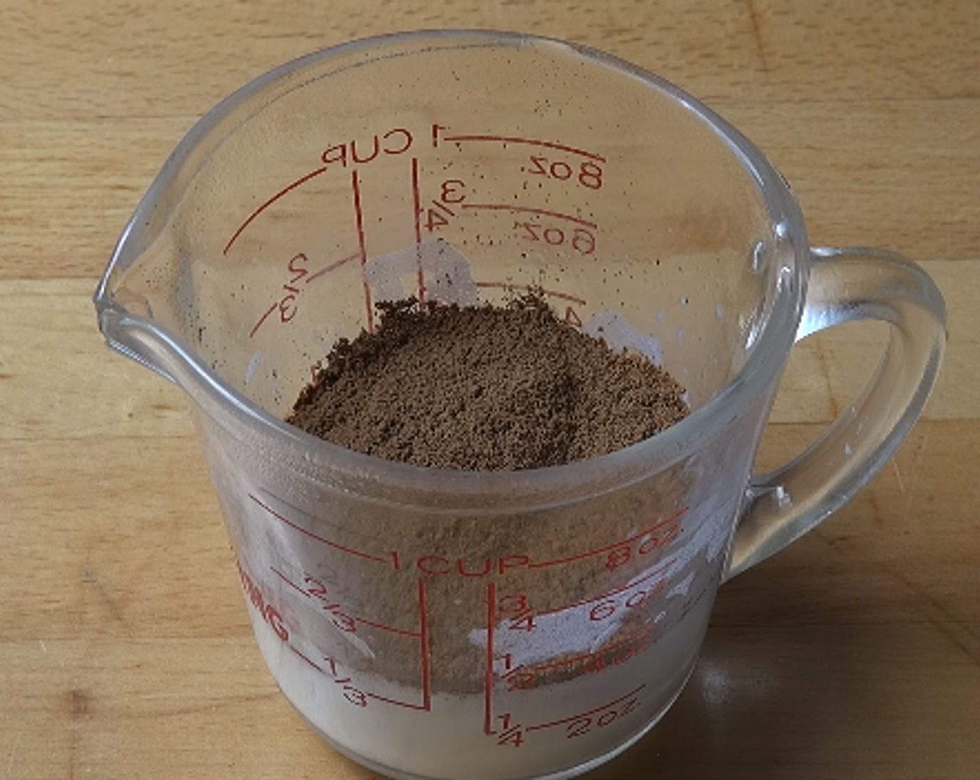 step 4 Heat Milk (4 Tbsp) in microwave until hot and add Instant Coffee (2 Tbsp). Mix together.
