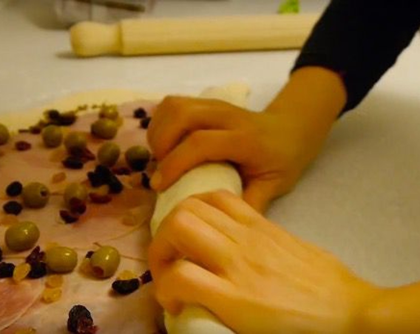 step 7 Carefully start to roll the dough.