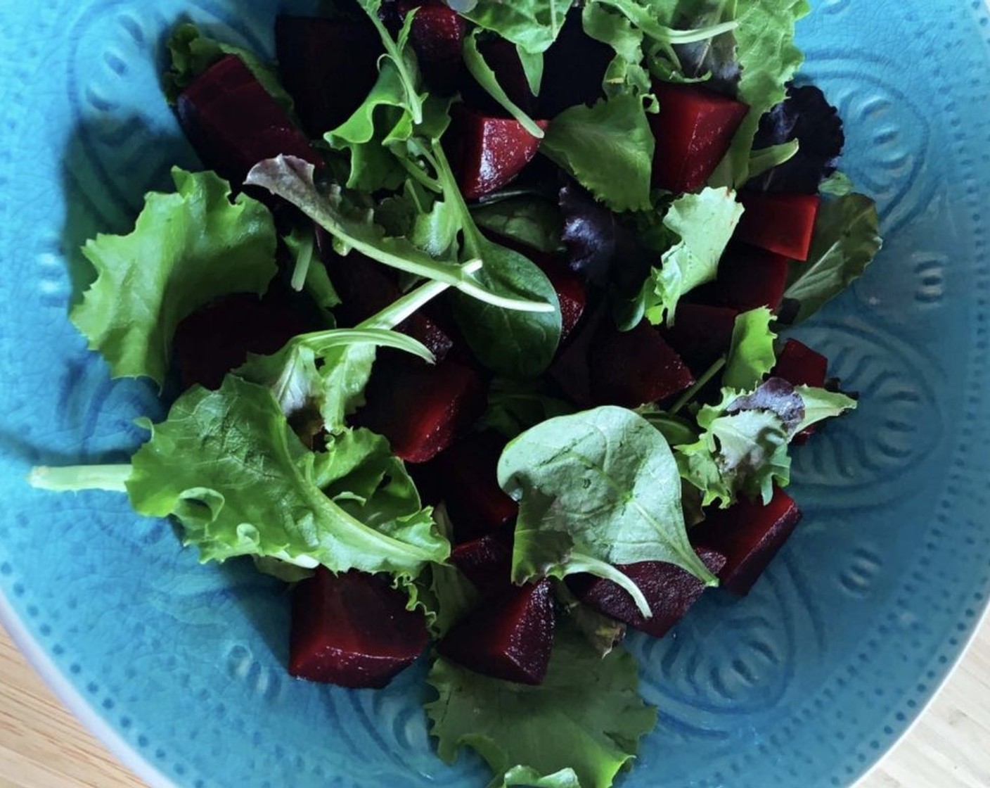 step 2 Into a large bowl, add the Beets (2), Spring Mix Greens (2 cups), Walnuts (8), and zucchini.