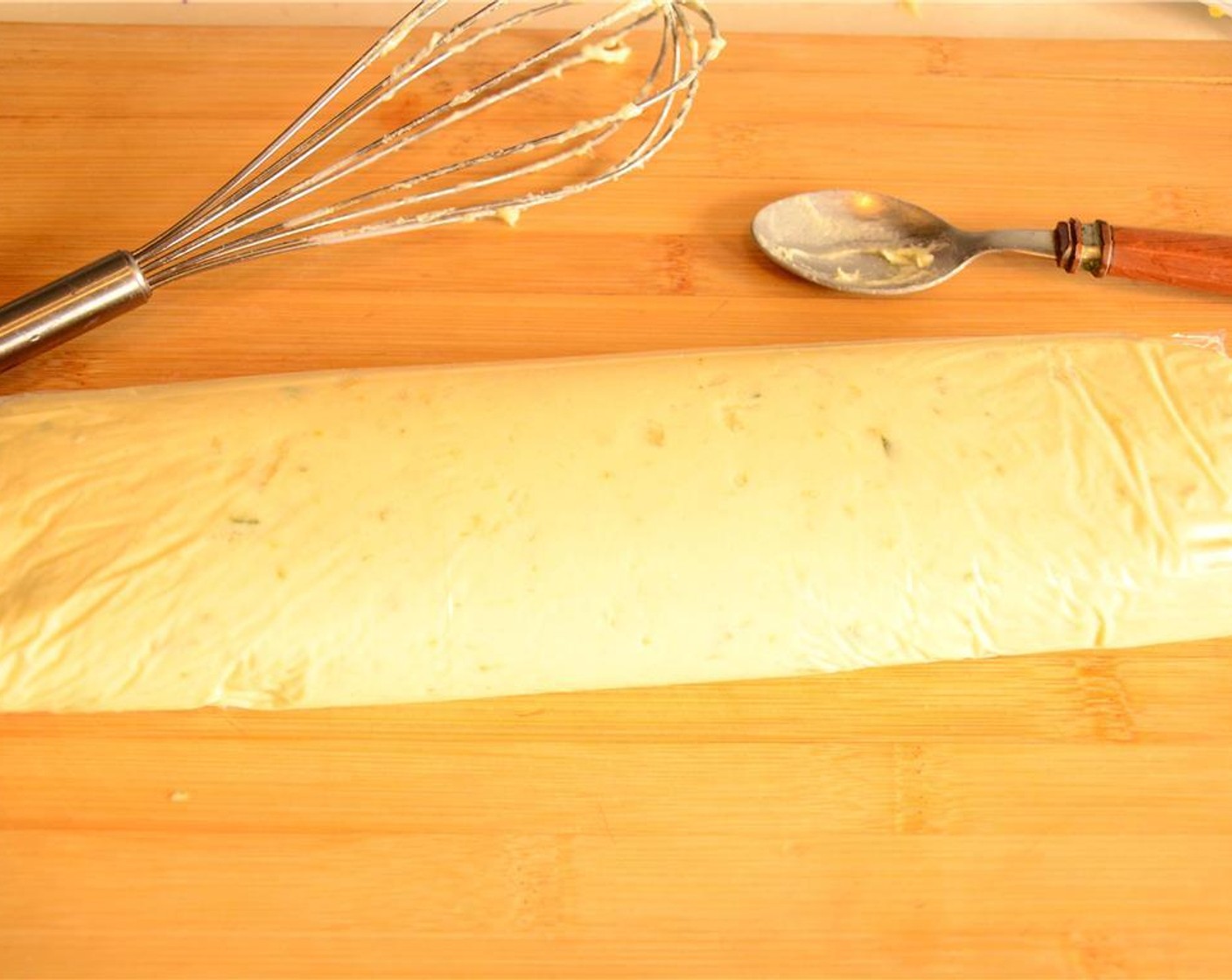 step 11 Use the plastic wrap to cover the batter/dough and form it into a log.