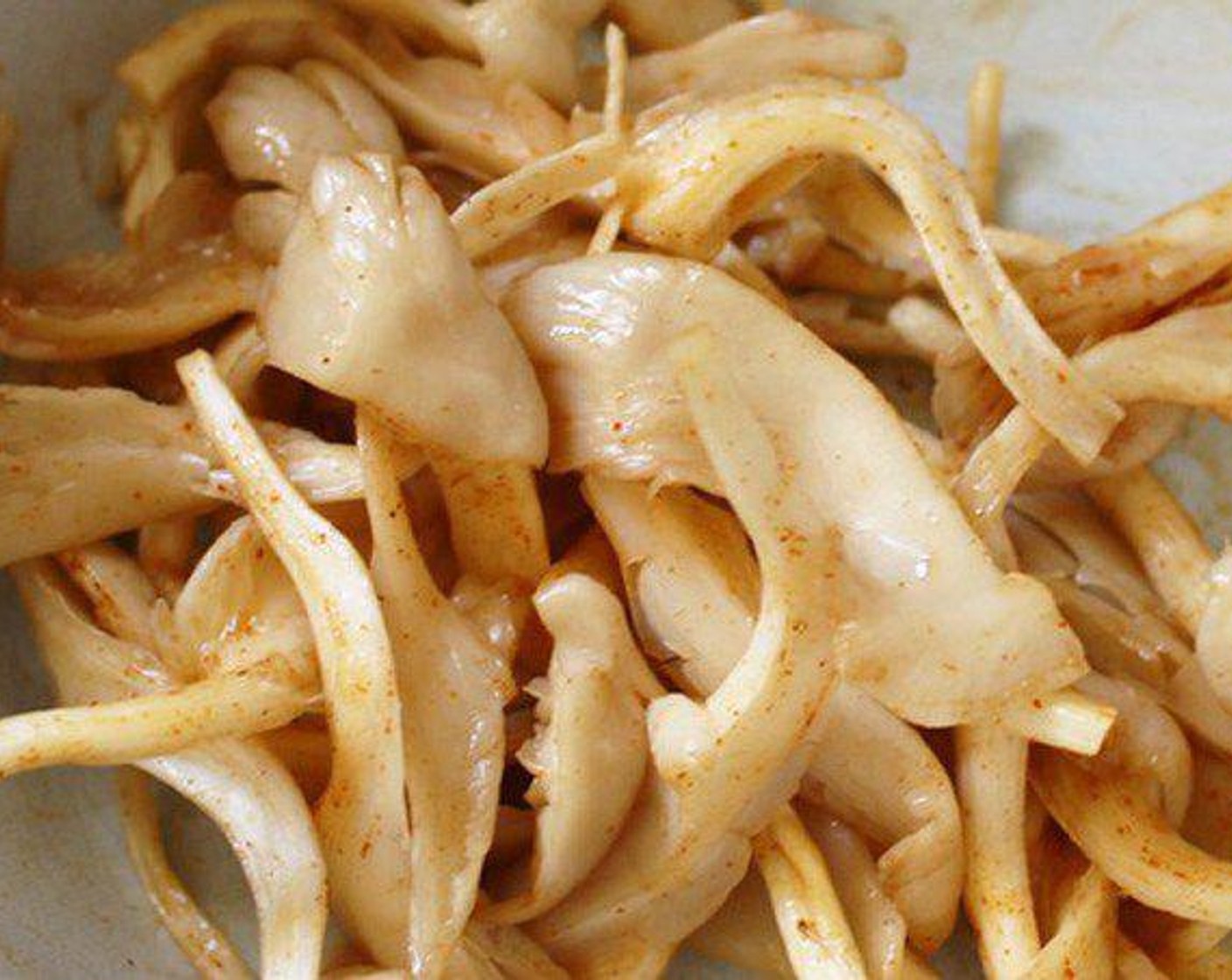 step 1 Gently mix Oyster Mushroom (1 cup) with Salt (1 pinch), Ground Black Pepper (1 pinch), Paprika (1 pinch) and Garlic (1/2 clove) in a mixing bowl, set aside.