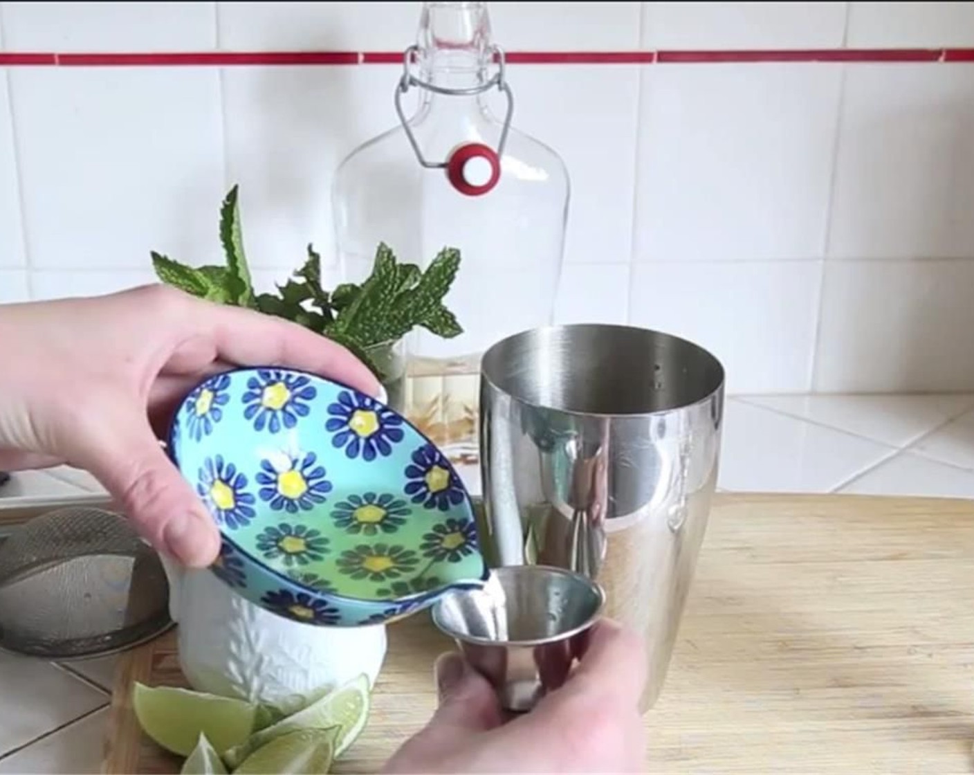 step 7 Next, add the ginger-infused rum, orange-thyme simple syrup, Orange (1/4) and Ice (to taste) to shaker tin. Place shaker tin top on tight and then shake until tin turns frosty.