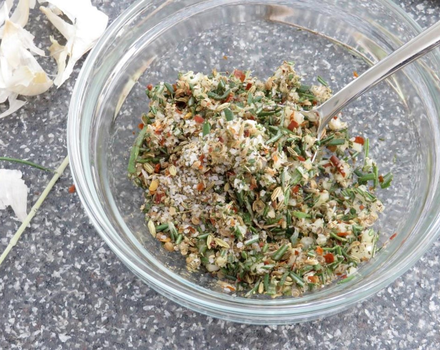 step 2 In a small bowl, add the Fresh Rosemary (1 1/2 Tbsp), Garlic (3 cloves), Kosher Salt (1 tsp), Ground Black Pepper (1/2 tsp), and crushed spices. Stir to combine.