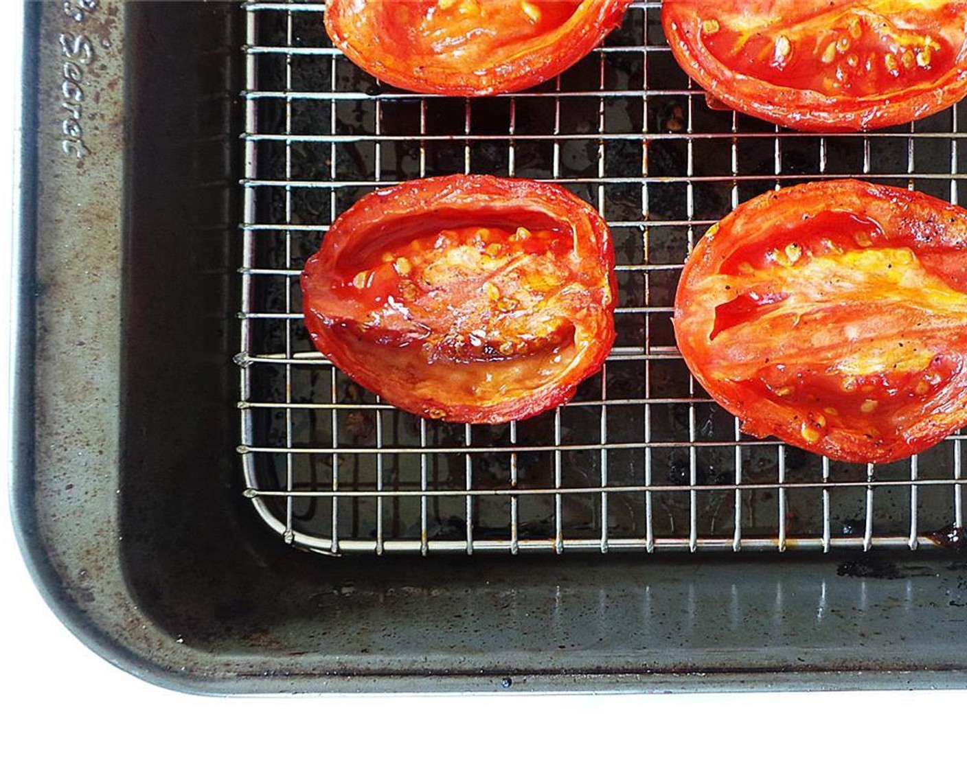 step 3 Place on baking sheet and roast 1 hour. Roasting is done when the tomato skin is wrinkly and the tomatoes are nice and juicy.