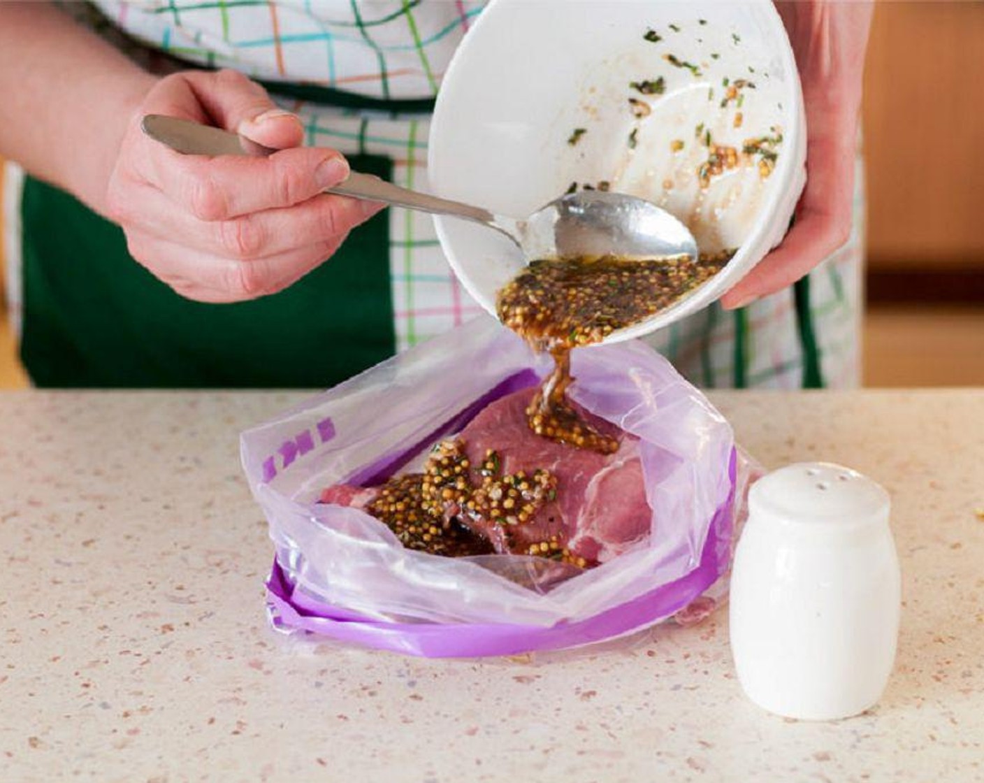 step 2 Whisk together the Extra-Virgin Olive Oil (2 Tbsp), Dried Rosemary (3/4 tsp), Paprika (1/2 tsp), Dried Sage (1/2 tsp), and Salt (1/2 tsp) and Ground Black Pepper (1/2 tsp) in a small bowl. Pour mixture over the pork chops.