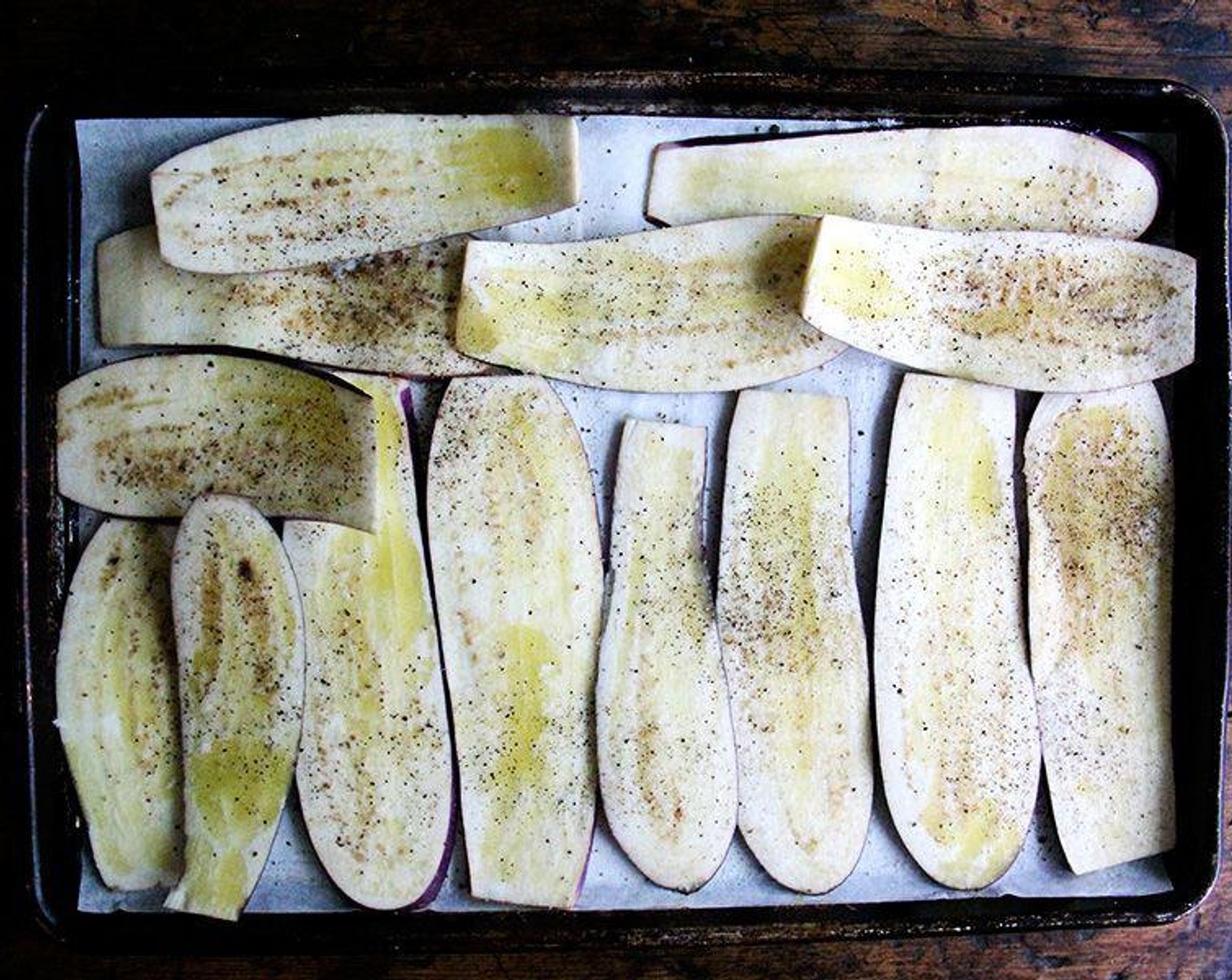 step 3 Brush each eggplant slice with some Olive Oil (as needed). Season with Kosher Salt (to taste) and Freshly Ground Black Pepper (to taste). Roast for 10 minutes.
