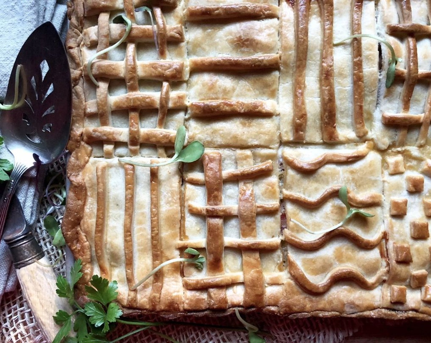 step 14 Cut into 10 rectangles to serve. If desired, partially wrap each portion with waxed paper or bakery tissue, then tie with kitchen twine. Serve warm or at room temperature. Pie can sit out for up to 2 hours. Reheat any remaining slices in a 350 degrees F (175 degrees C) oven for 15 minutes.