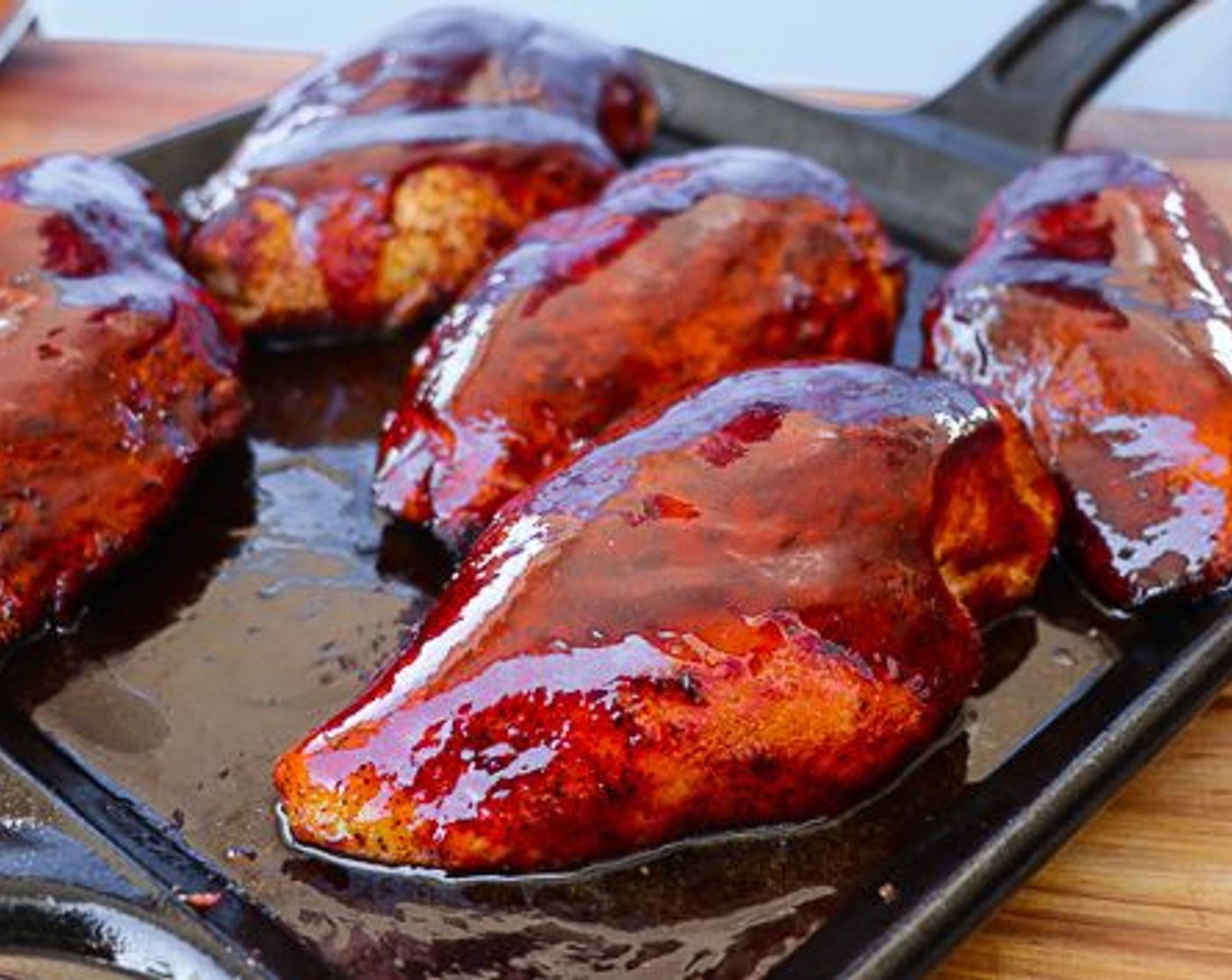 step 4 When the internal temp reaches 155 degrees F (68 degrees C) transfer the chicken breasts to a flat iron skillet and glazes with Barbecue Sauce (1 cup). Continue to cook the breasts until the internal reaches 165 degrees F (73 degrees C).
