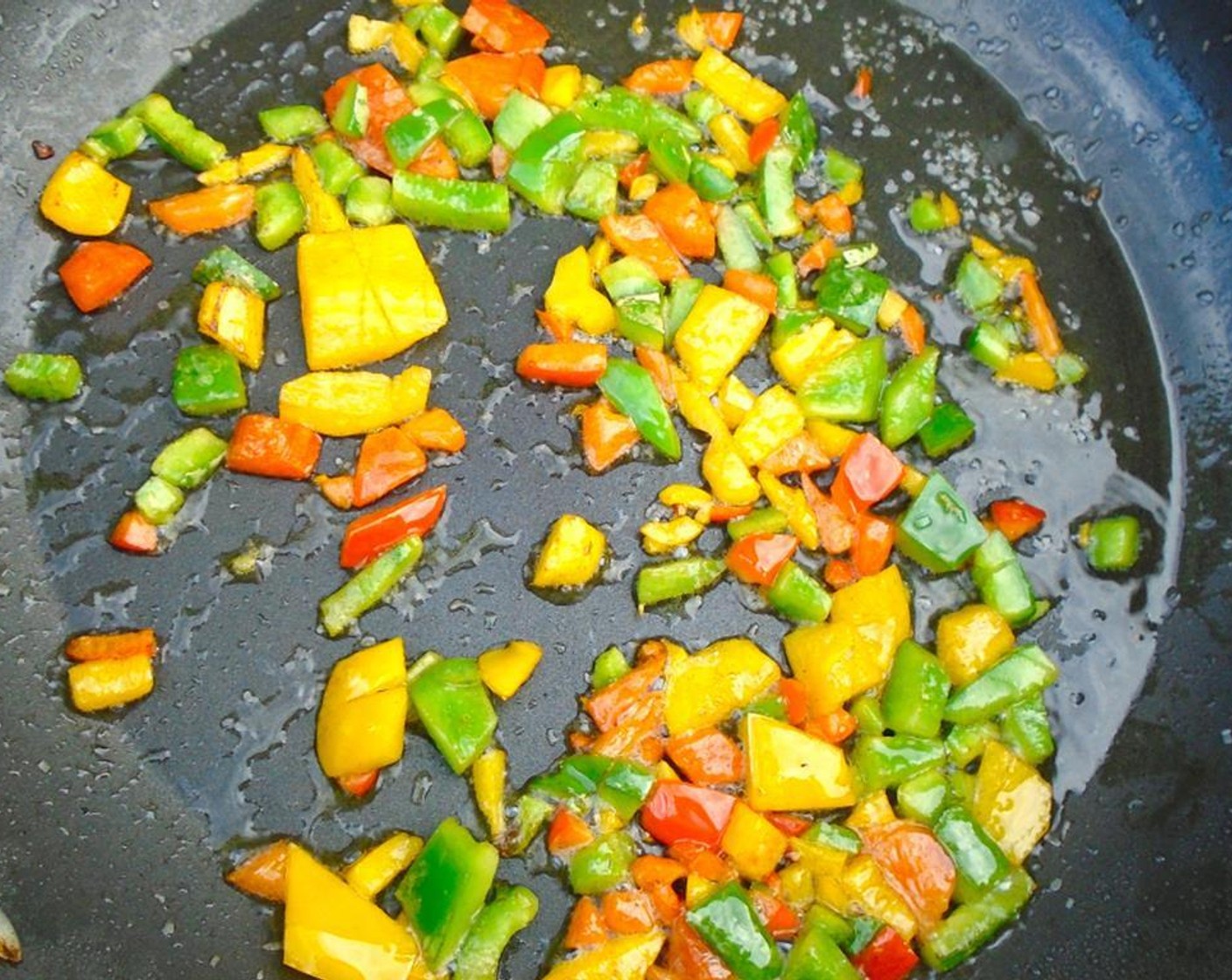 step 9 Sauté the Bell Peppers and Garlic in Olive Oil until tender for about 4 minutes.