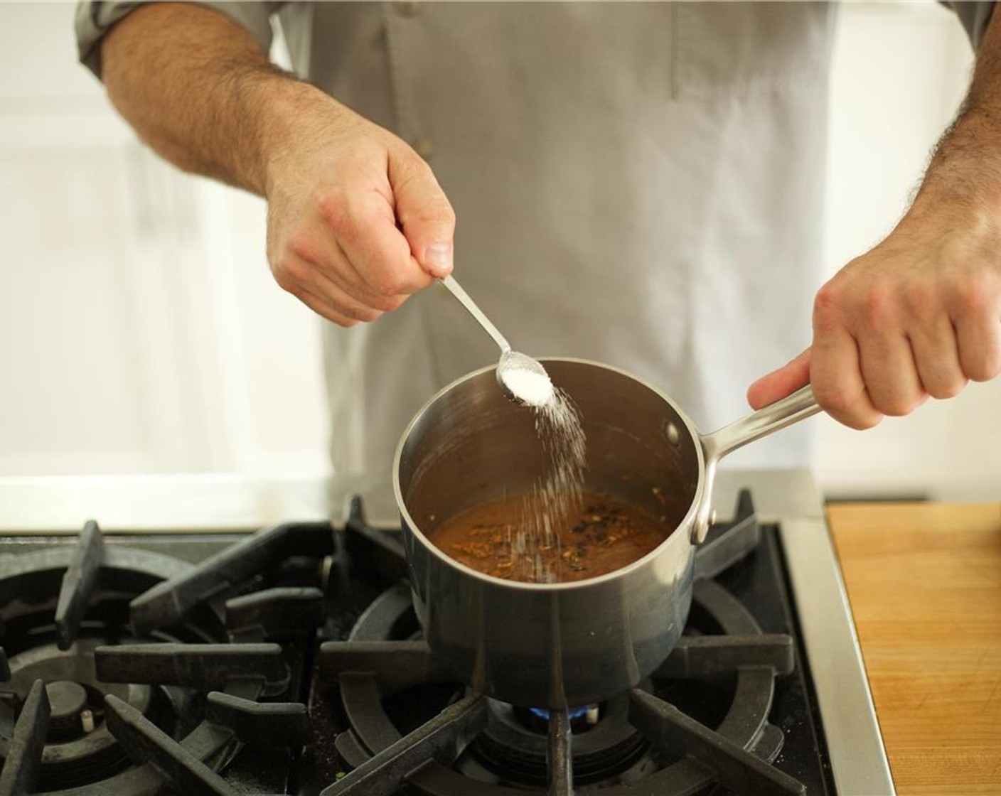 step 4 Add Black Rice (2/3 cup), chicken broth, Salt (1/2 tsp), and All-Purpose Seasoning (1 tsp). Bring to a boil, stir once, reduce to heat to simmer, cover, and cook for 45 minutes.