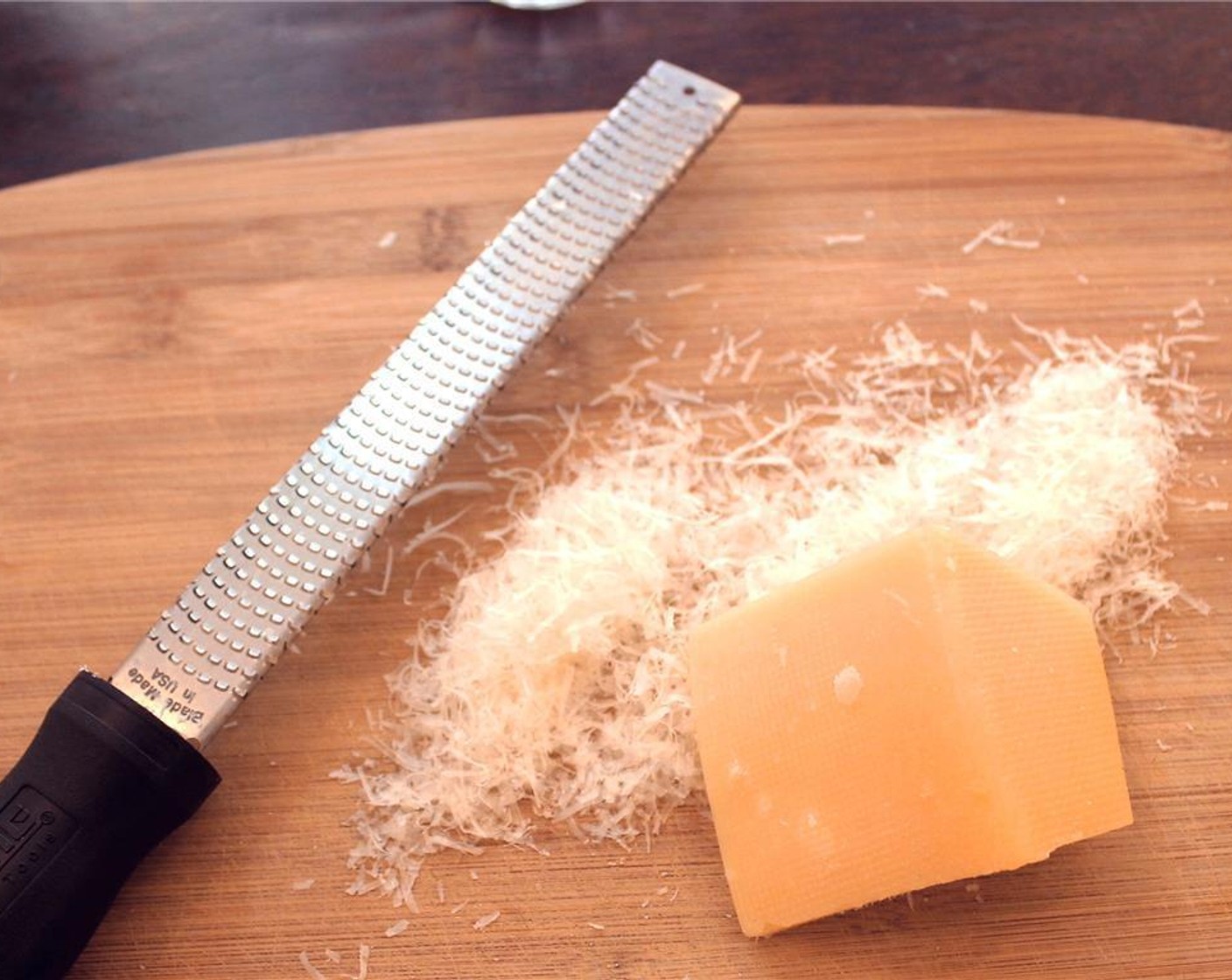 step 2 Grate Parmesan Cheese (1/3 cup) and set aside.