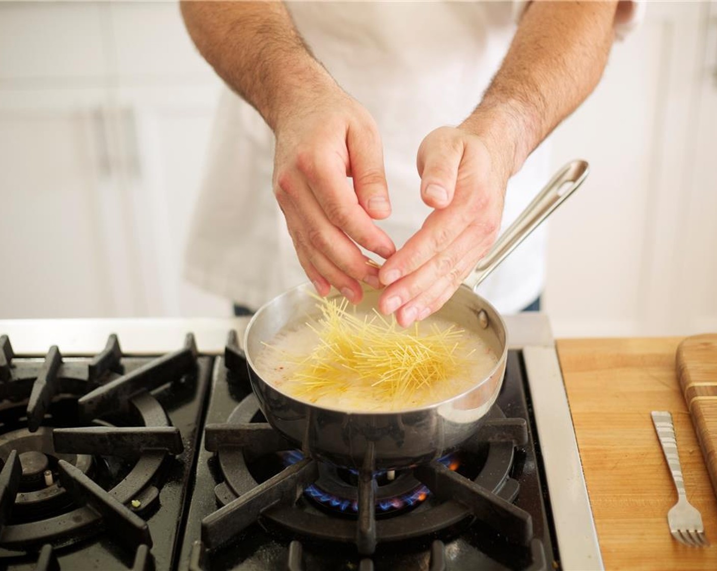 step 4 Break the Angel Hair Pasta (3 oz) in half, and then in half again. Add to the soup. Stir to ensure the pasta does not stick.