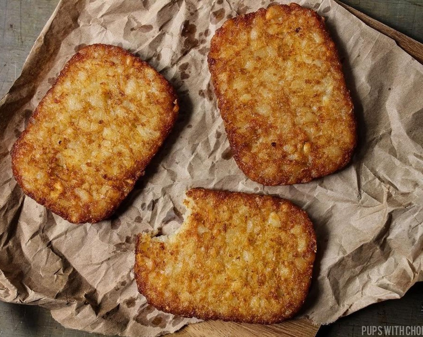 step 4 If you are using the Frozen Shredded Hash Browns (2), set the oil to 375 degrees F (190 degrees C) and fry them for 1-2 minutes a side. If you are baking them, follow the instructions in the packaging until they are golden and crispy. You can also crispy these up in a frying pan on medium heat with a bit of oil as well.