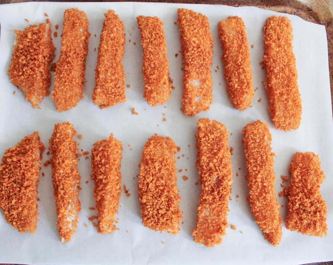 step 15 Place each piece of breaded fish on the baking sheet about an inch apart. Transfer the breaded fish to the oven and bake for 10 minutes until the fish is opaque throughout.