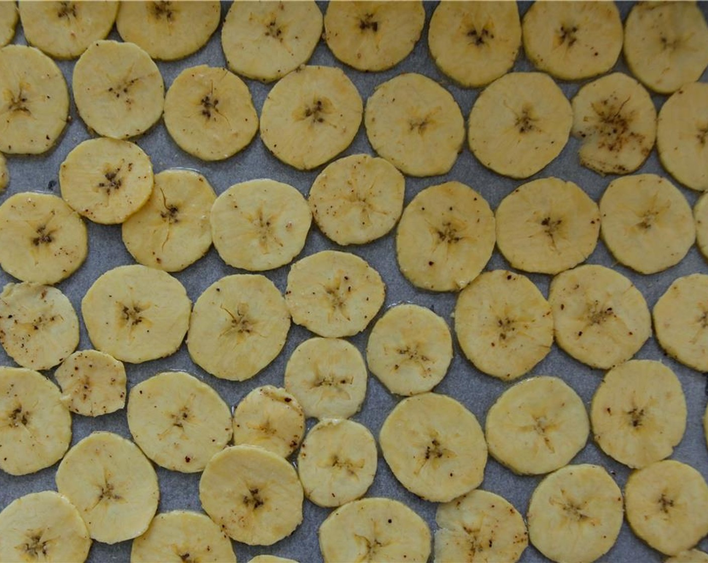 step 7 Layer the plantain on the baking tray, they will stick to each other if they overlap so make sure they have a little room.