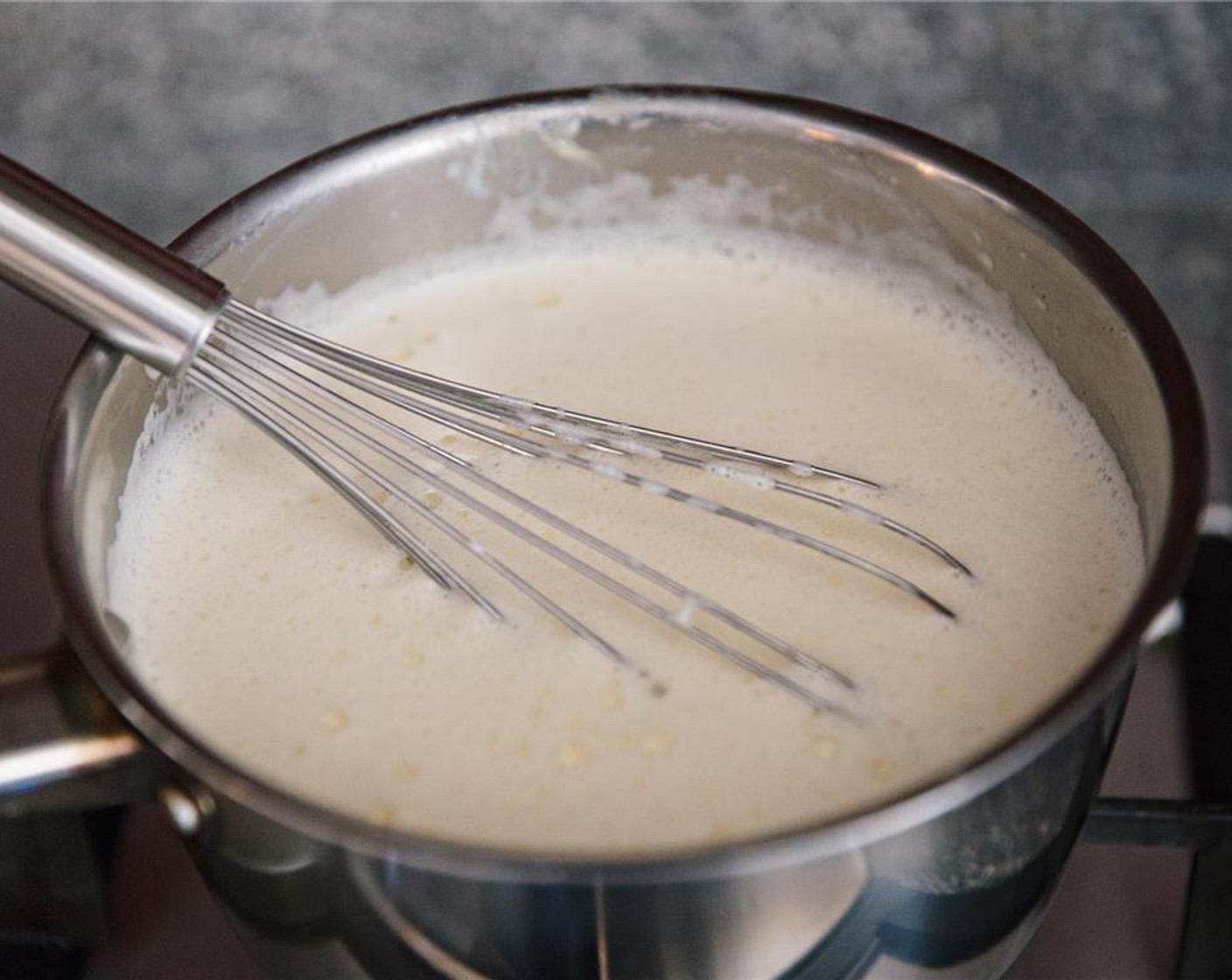 step 5 Pour the custard mixture back into the pot, and place back on a low heat.