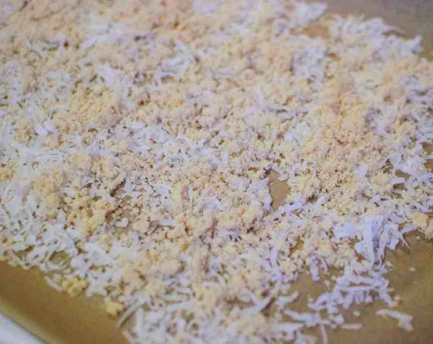 step 6 Line a rimmed baking sheet with parchment paper. Spread Sweetened Coconut Flakes (1 cup) on the prepared baking sheet. Sprinkle Brown Sugar (1/4 cup) on top.