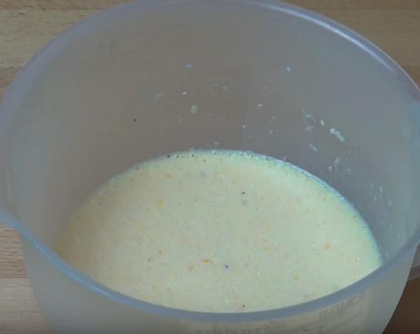 step 1 In a mixing jug, add Eggs (3), Milk (1 cup), Salt (to taste), Ground Black Pepper (to taste), and Parmesan Cheese (1/2 cup). Using a whisk, mix together.