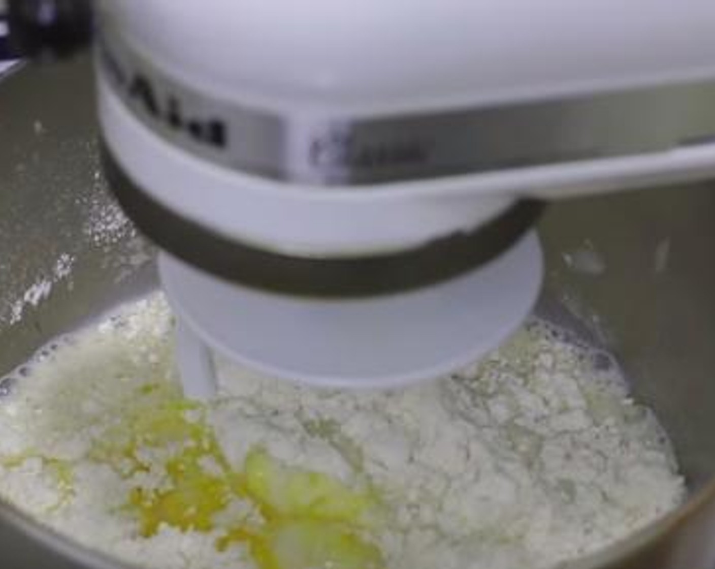 step 1 In a mixing bowl, mix together the All-Purpose Flour (3 cups), Caster Sugar (4 Tbsp), Active Dry Yeast (2 tsp), and Salt (1 tsp). Then whisk in the Farmhouse Eggs® Large Brown Egg (1), Milk (1 cup), and Butter (4 Tbsp). Mix everything well until smooth.