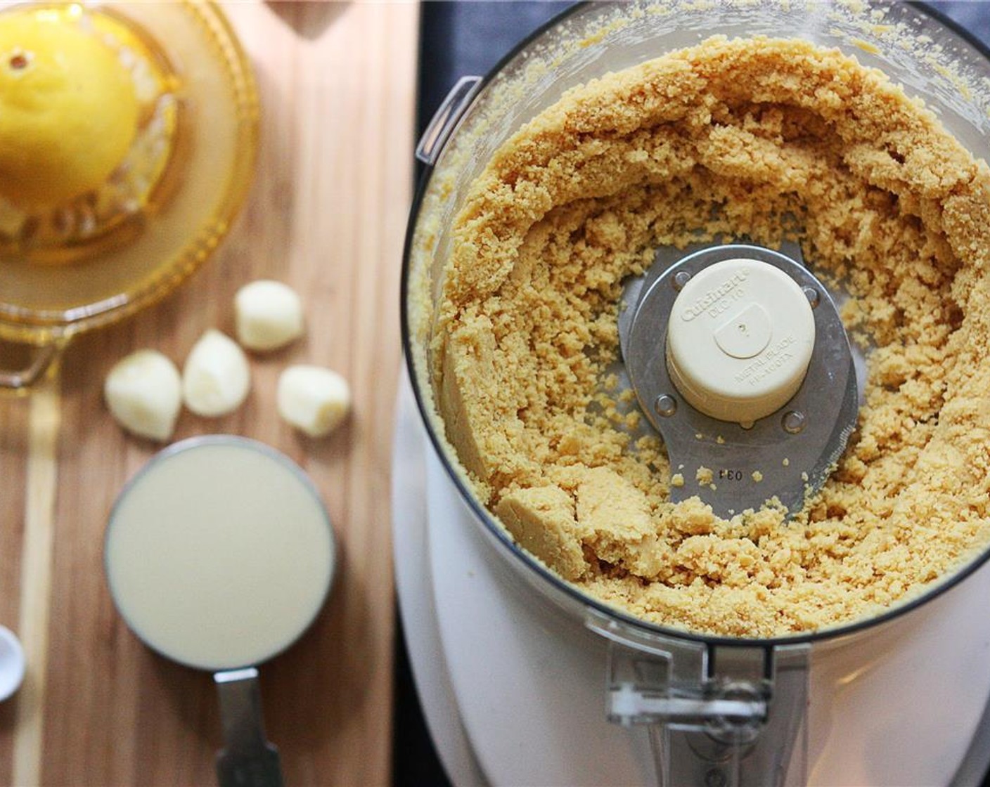 step 2 Pulse the chick peas in a food processor until light, powdery clumps are formed, about 45 seconds.