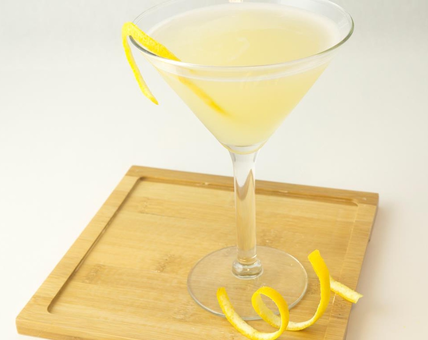 step 7 Garnish with a Lemon Peel and serve.