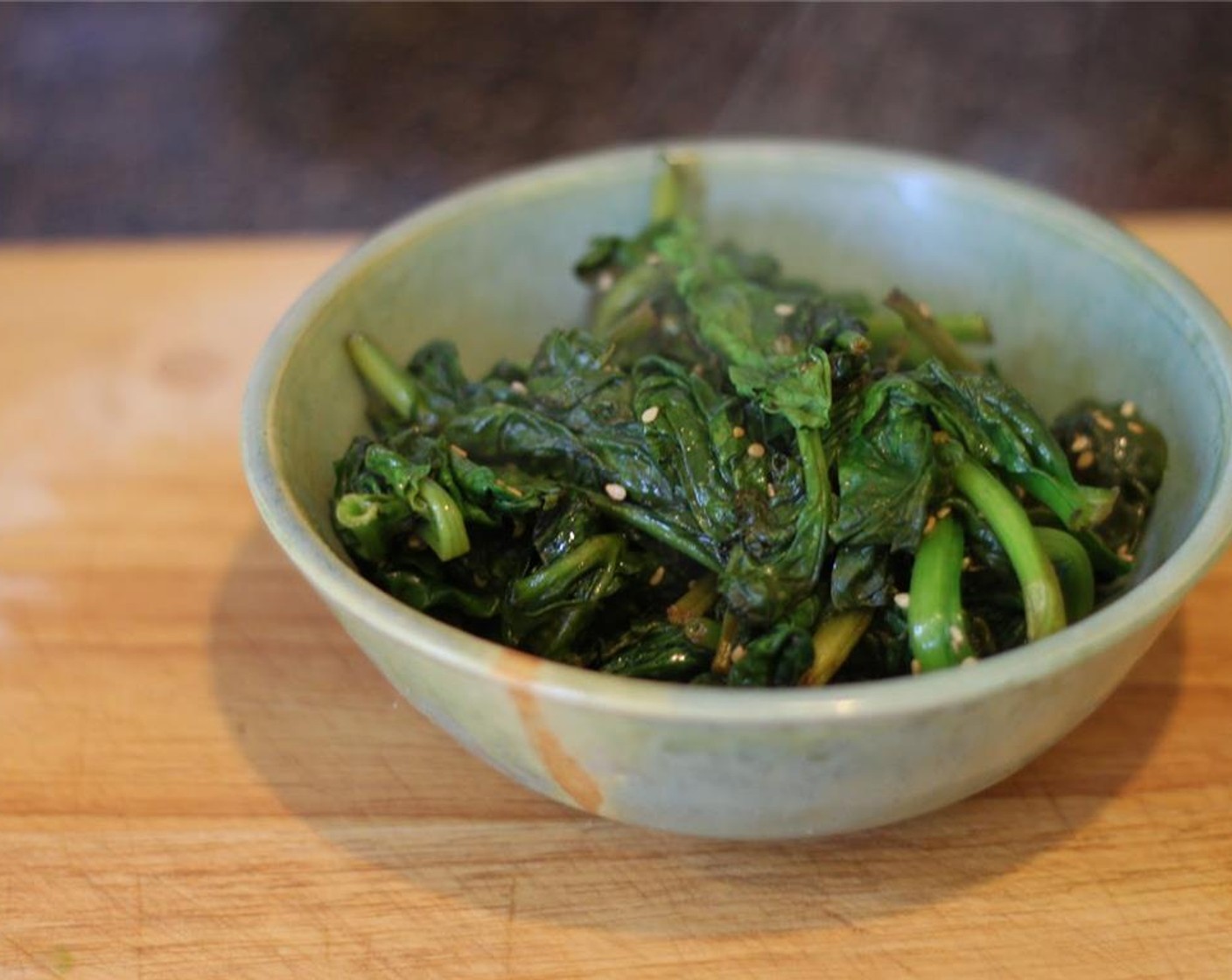 step 8 Cook until the spinach is wilted and then add the toasted sesame seed. Remove from pan and keep in microwave to stay warm.