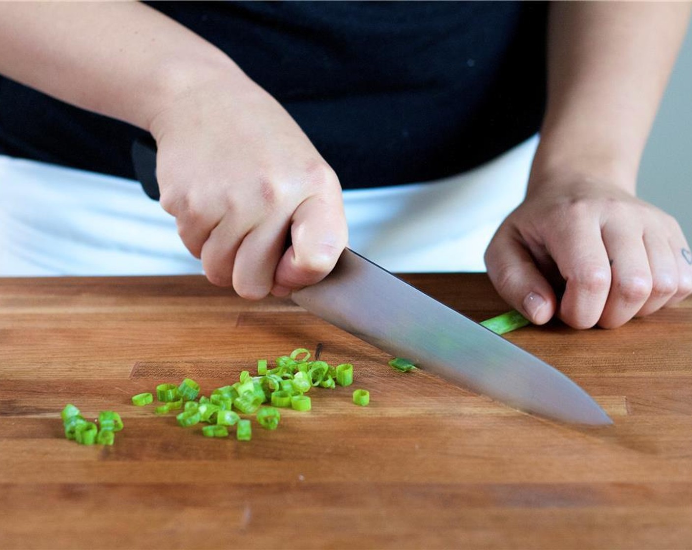 step 3 Thinly slice the Scallion (1 bunch) into quarter inch thick slices, and set aside.