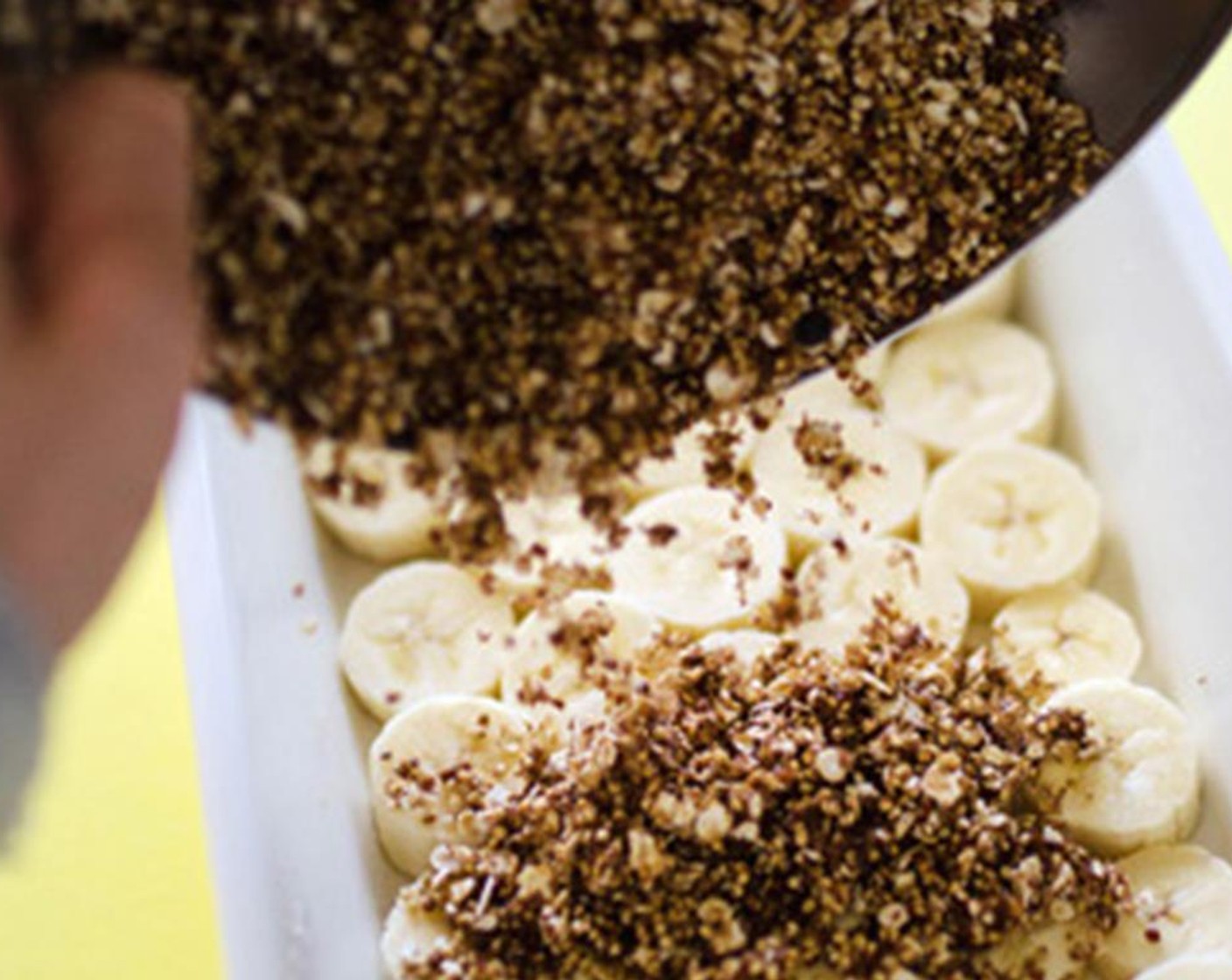 step 2 In a separate bowl, combine Quinoa (1/2 cup), Old Fashioned Rolled Oats (1/2 cup), Brown Sugar (4 Tbsp), Simply Organic Cinnamon, Ground (1 tsp) and Salt (1/4 tsp). Pour mixture over the bananas.
