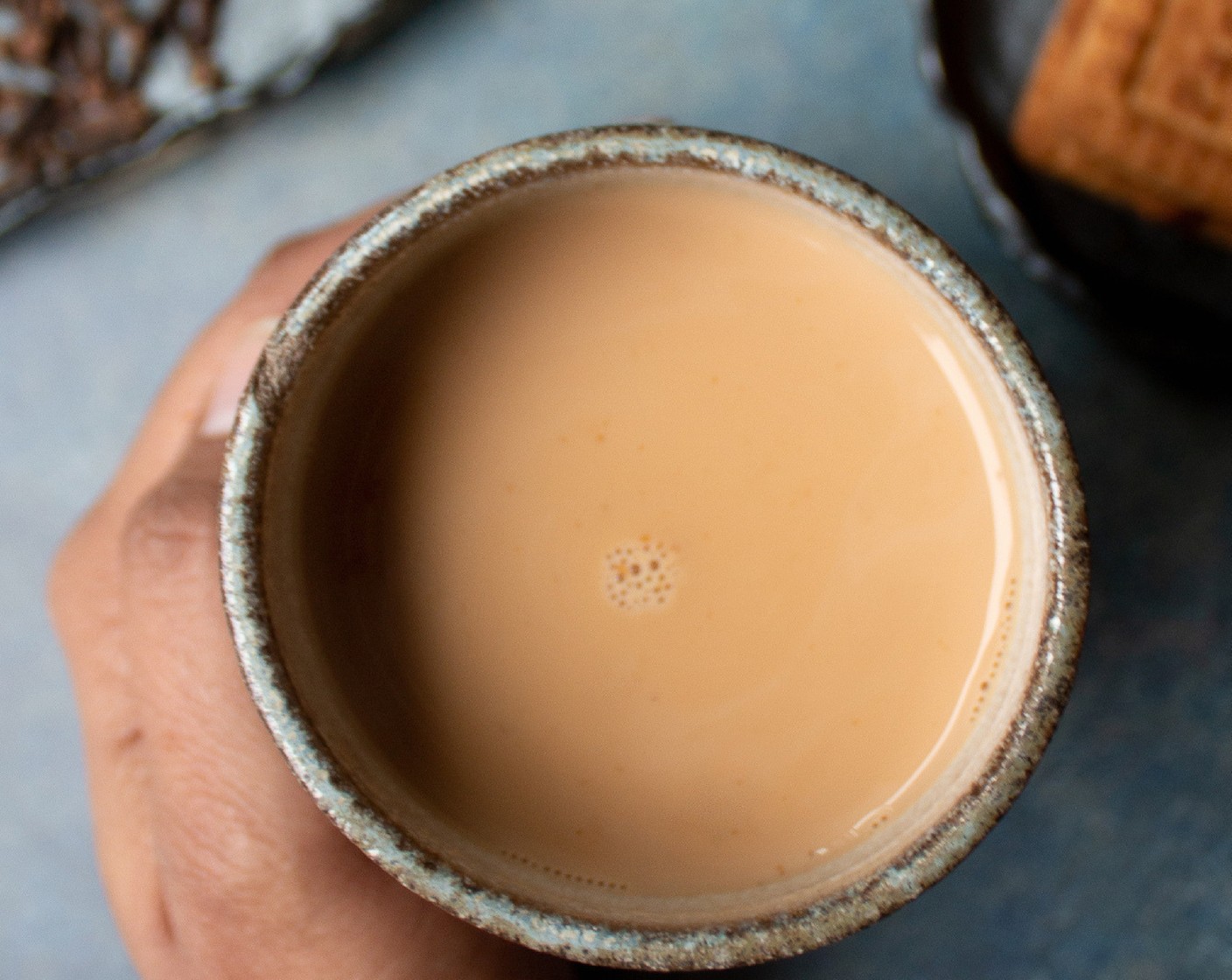 step 4 Strain the chai into your mug and top off with extra milk (about 1-2 Tbsp) to cool.