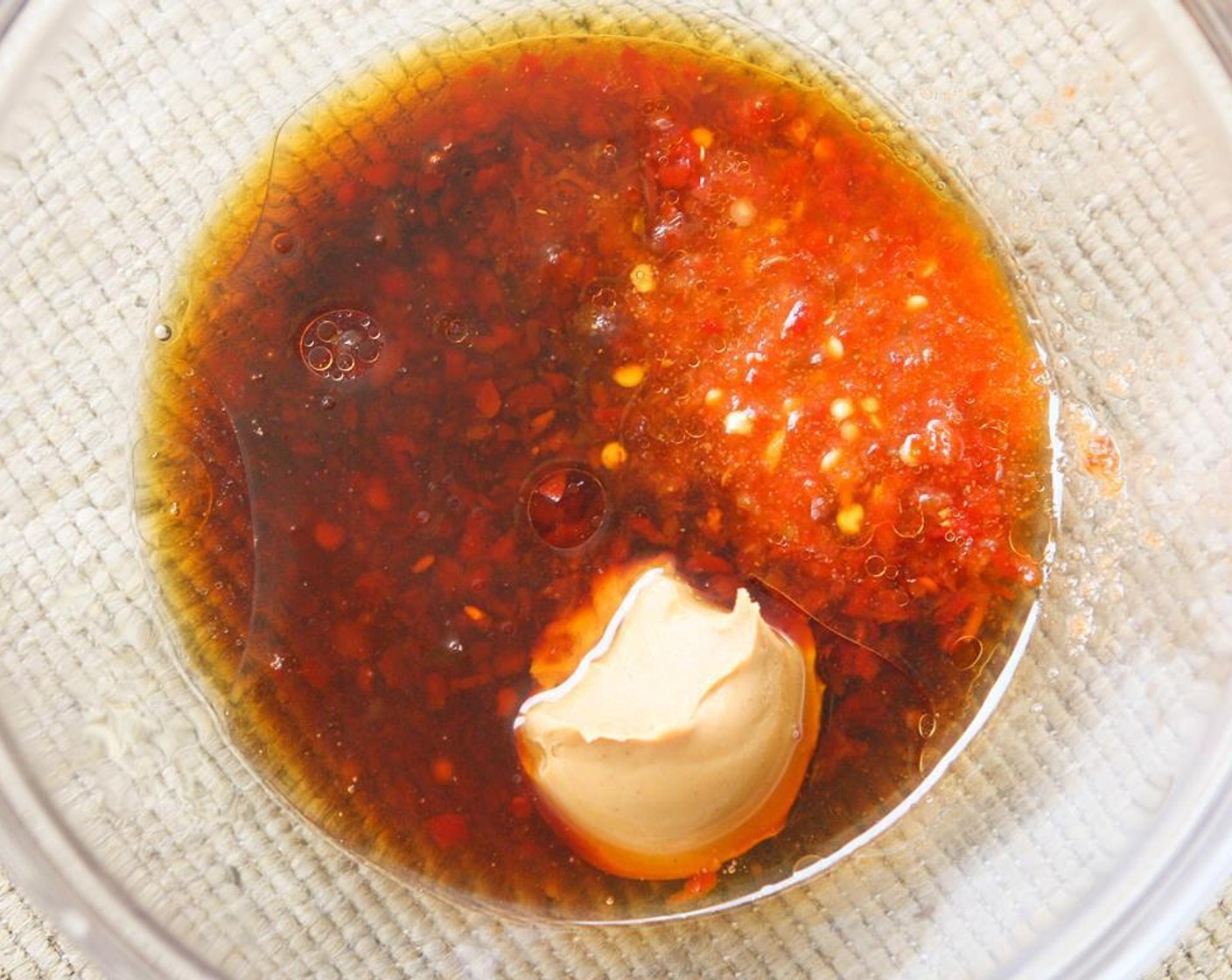 step 4 Meanwhile, in a microwaveable bowl, combine the Soy Sauce (2 Tbsp), Rice Vinegar (1 Tbsp), Sesame Oil (1 Tbsp), Peanut Butter (1 Tbsp), Water (1 Tbsp), Honey (1 Tbsp) and Chili Garlic Sauce (2 Tbsp).