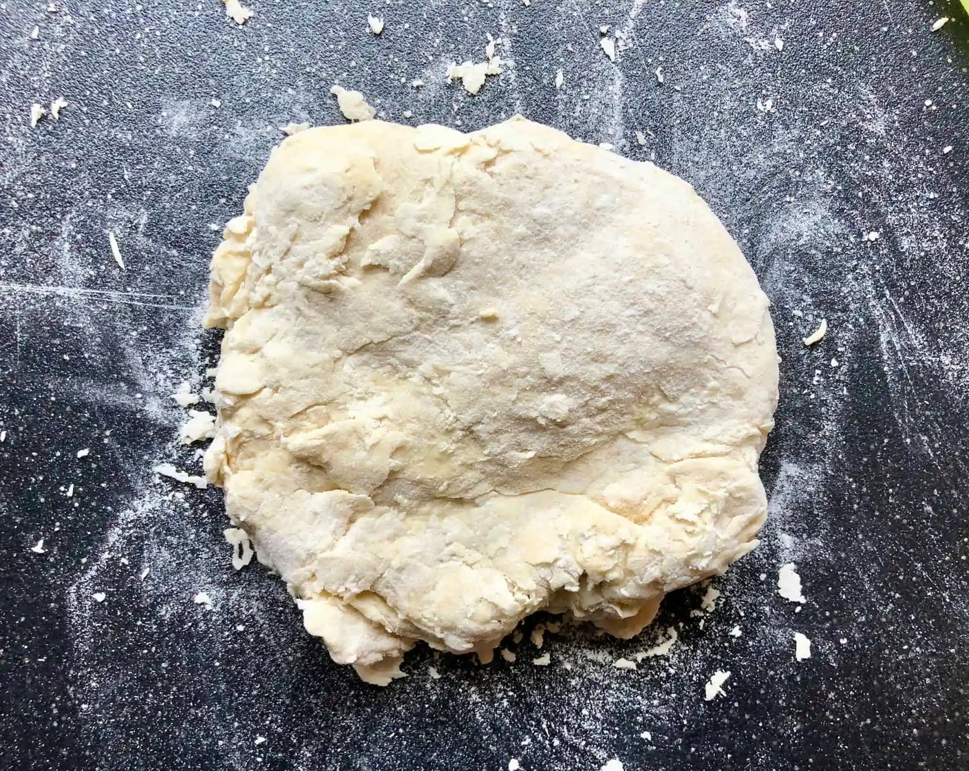 step 4 Turn the dough onto the counter and knead for 3-5 minutes. The dough should be firm but silky smooth when you are done. If your dough is too tacky as you knead it, sprinkle with a little extra flour.