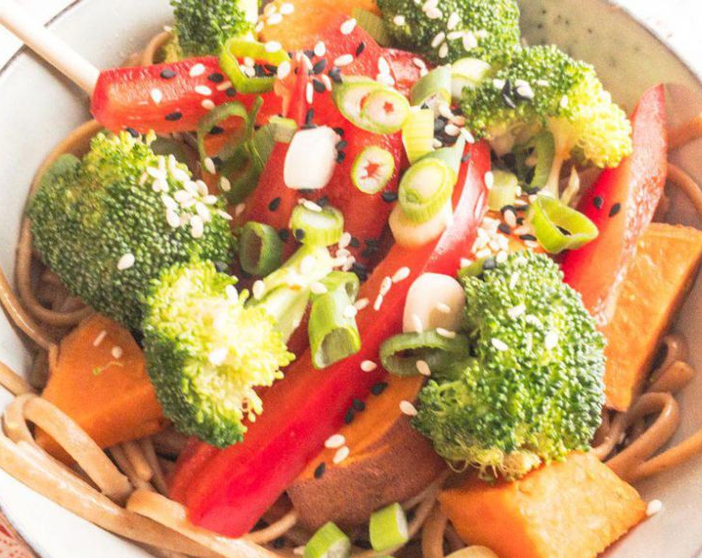 step 5 Pile noodles in a bowl with veggies on top. Add Scallions (3 stalks) and Roasted Sesame Seeds (to taste) and enjoy!
