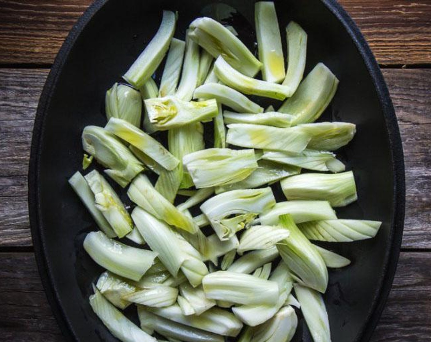 step 3 Once fennel has softened and slightly caramelized, add in the Canned White Beans (3 cups), Dry White Wine (4 Tbsp), and Lemon (1) and cook for about 5 minutes more.