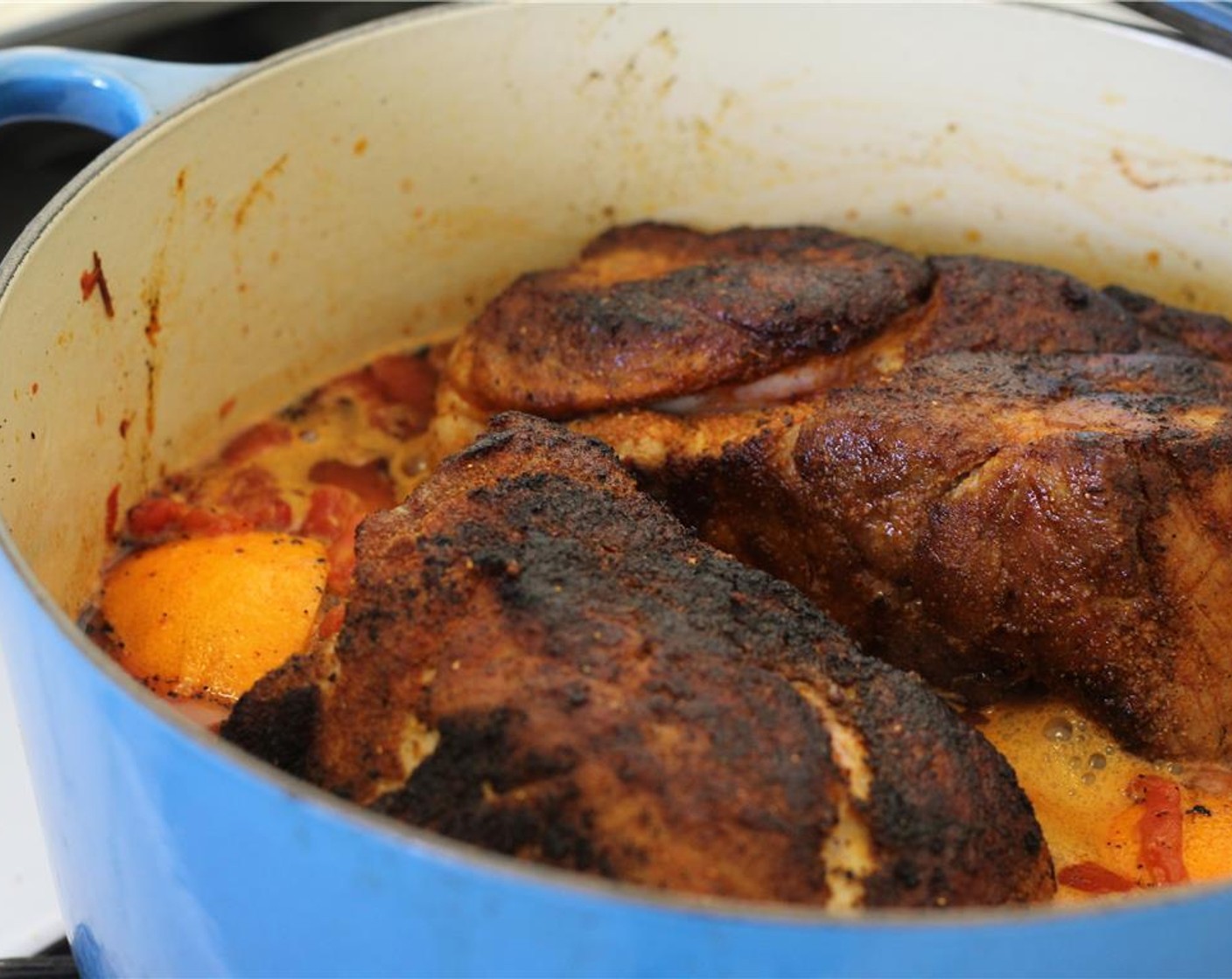 step 7 Bring it to a low boil and then carefully return the meat to the pot. Pop the lid on and transfer it to the preheated oven. Let the meat braise for at least 2 hours and up to 3.