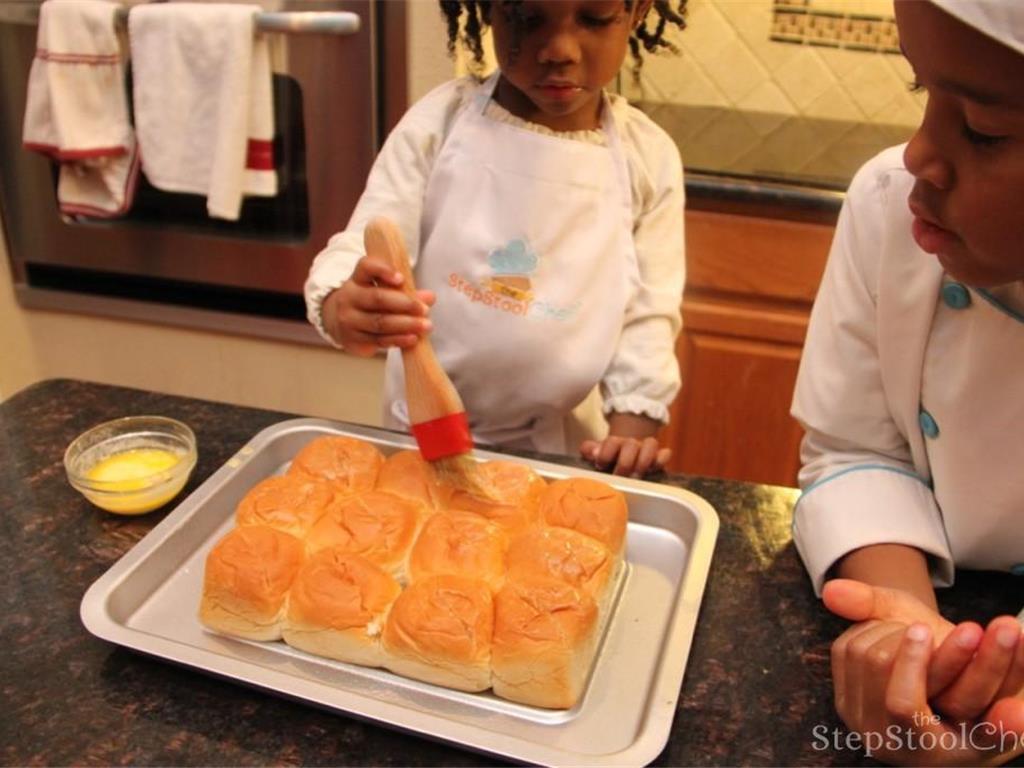 Step 3 of Pull Apart BBQ Chicken Sliders Recipe: Brush the top of the pull apart dinner roll with Butter (2 tablespoon).