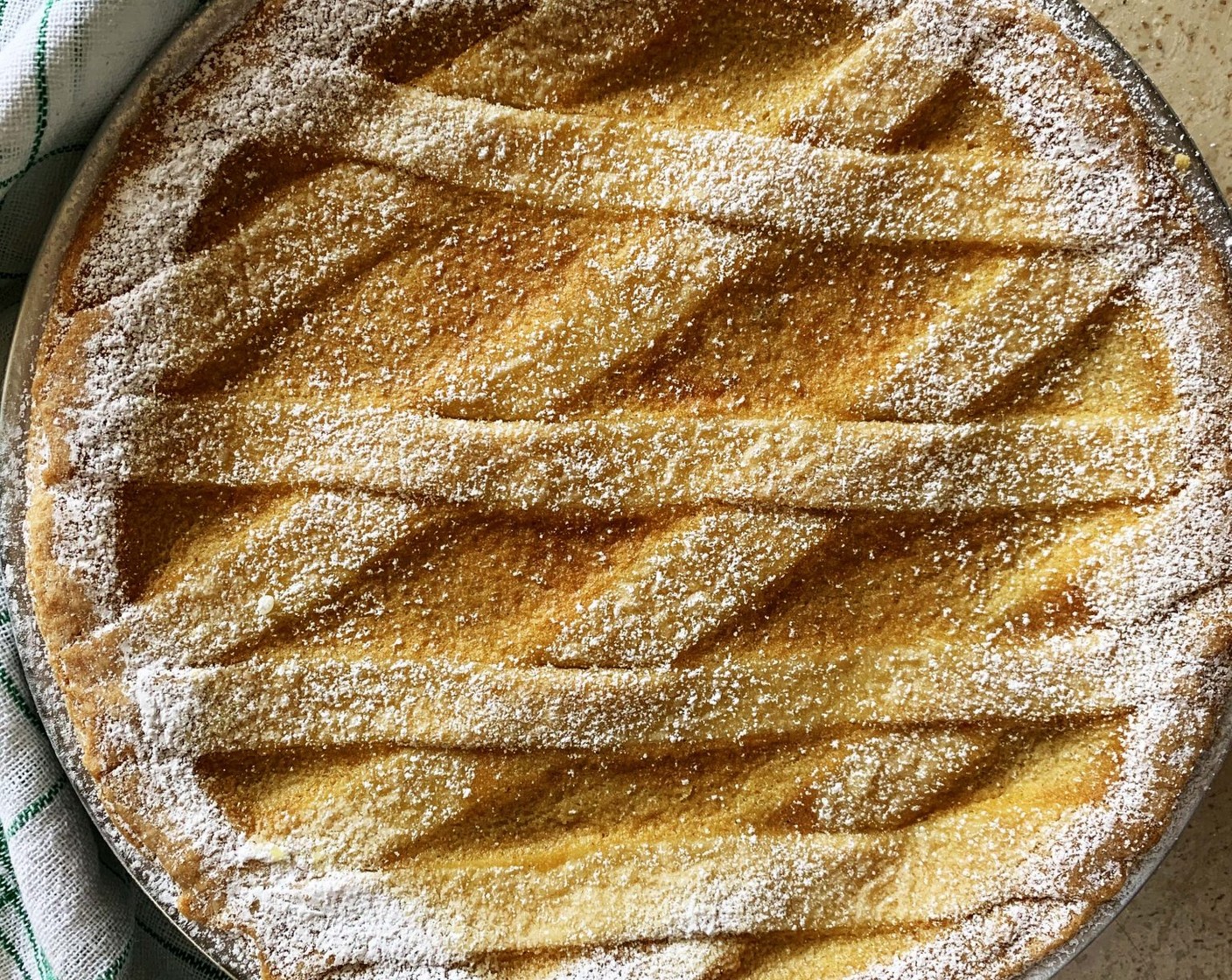 step 15 When the pastiera is fully cooled down, dust the top with some Powdered Confectioners Sugar (to taste), cover with plastic wrap, and wait at least 2 to 3 days before serving it.