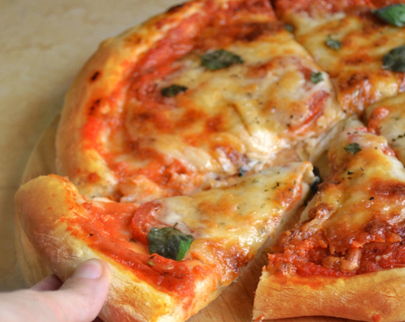 step 6 Bake pizza for around 10-15 minutes or until cheese has melted and the crust has turned golden brown. Add some Fresh Basil (to taste) before serving.