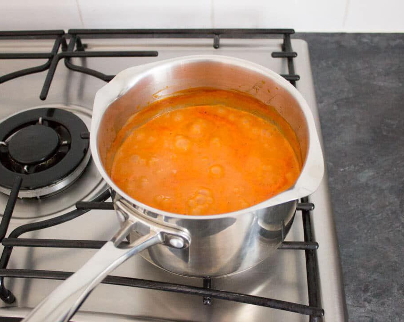 step 2 Bring it to the boil, giving it a good stir every now and then.