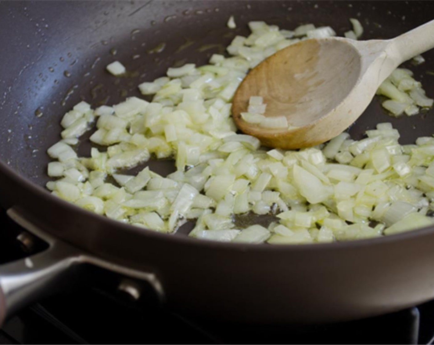 step 1 Heat the Extra-Virgin Olive Oil (1/4 cup) in a large pan over medium heat. Cook the Yellow Onions (1 1/2 cups) stirring frequently, until soft and translucent, about 8 minutes. Do not brown.