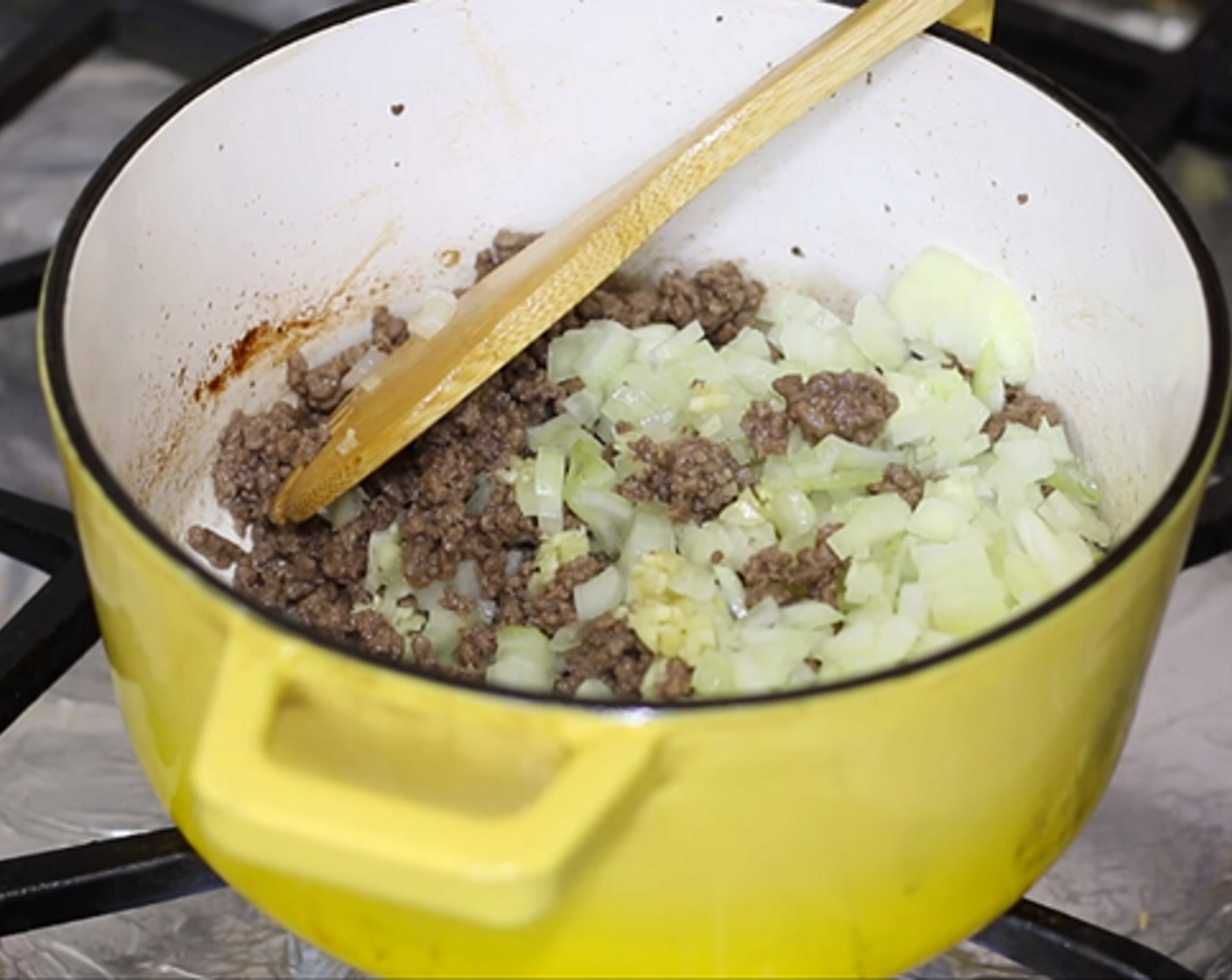 step 1 Preheat the oven to 350 degrees F (180 degrees C). Heat Olive Oil (1 tsp) in a pot over medium-high heat. Add Ground Beef (1 lb) and cook until browned. Strain excess grease. Add Onion (1), Garlic (3 cloves), Salt (to taste) and Ground Black Pepper (to taste) and cook for 3-5 minutes.