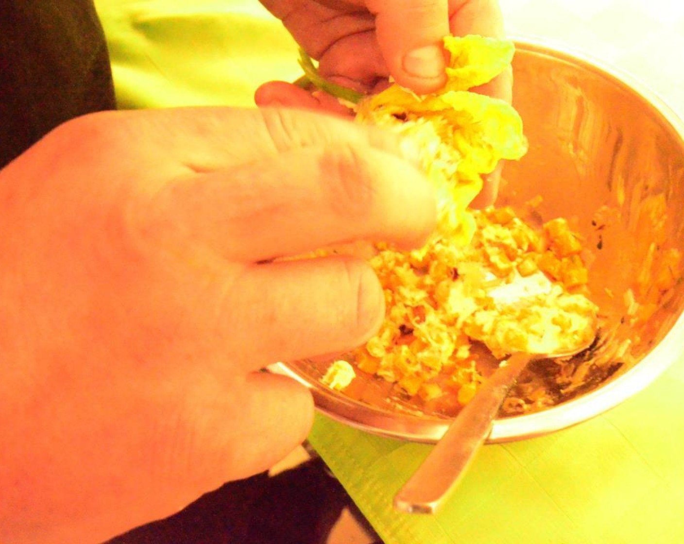 step 9 Mix the pumpkin, leeks, and shallots with the Ricotta Cheese (1 Tbsp) and the white of one Egg (1). Then, season with Salt (to taste) and Ground Black Pepper (to taste). Fill the Fresh Pumpkin Blossoms (2) with a bit of the mixture, and press lightly until closed.