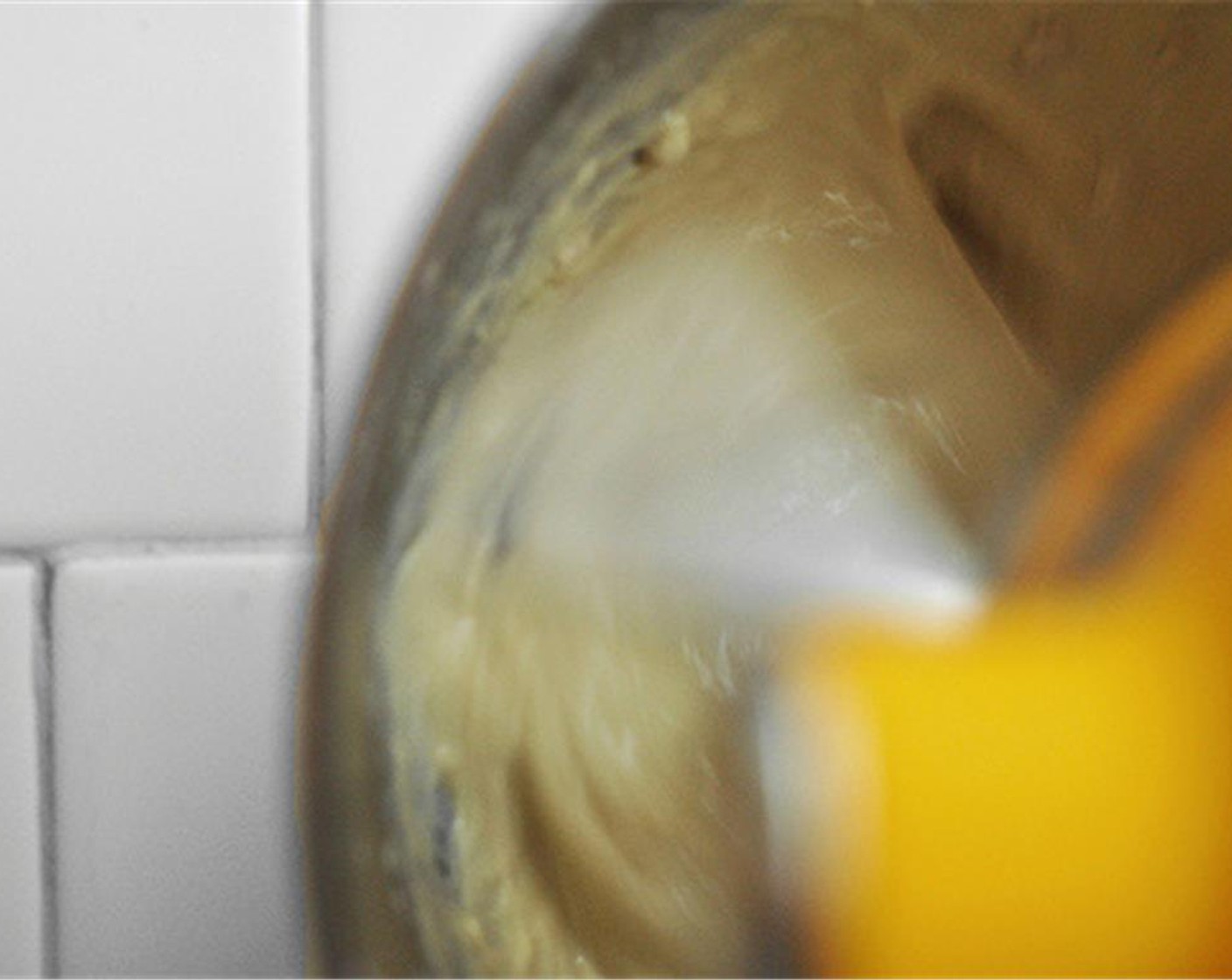 step 3 Combine the remaining  warm whole milk and Active Dry Yeast (1 Tbsp) in the bowl of a stand mixer fitted with the paddle attachment. Add the sponge, Granulated Sugar (2 Tbsp), Salt (1/2 tsp), Vanilla Extract (1 tsp), and Eggs (3).