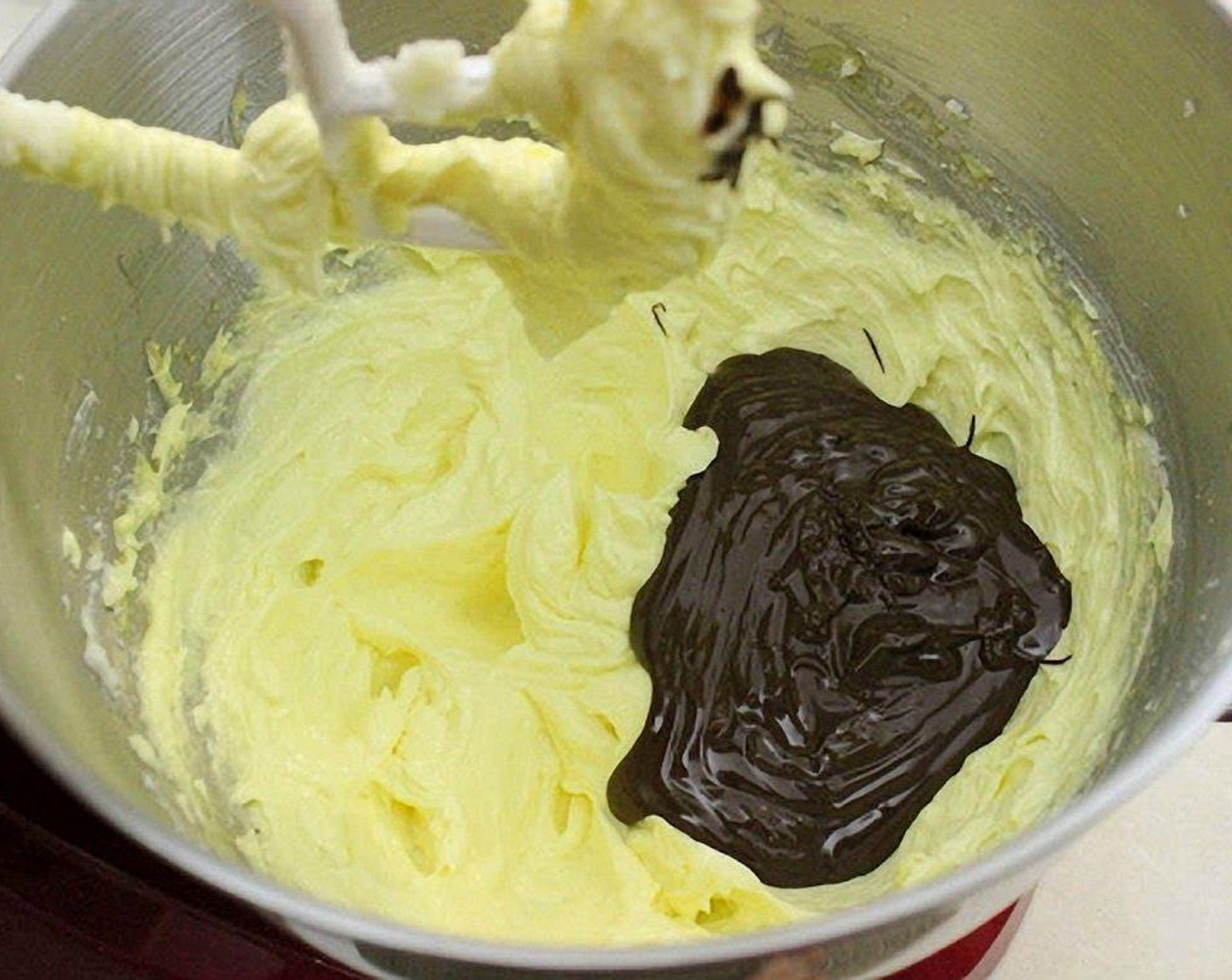 step 8 Add melted Chocolate (1 cup) to the bowl.