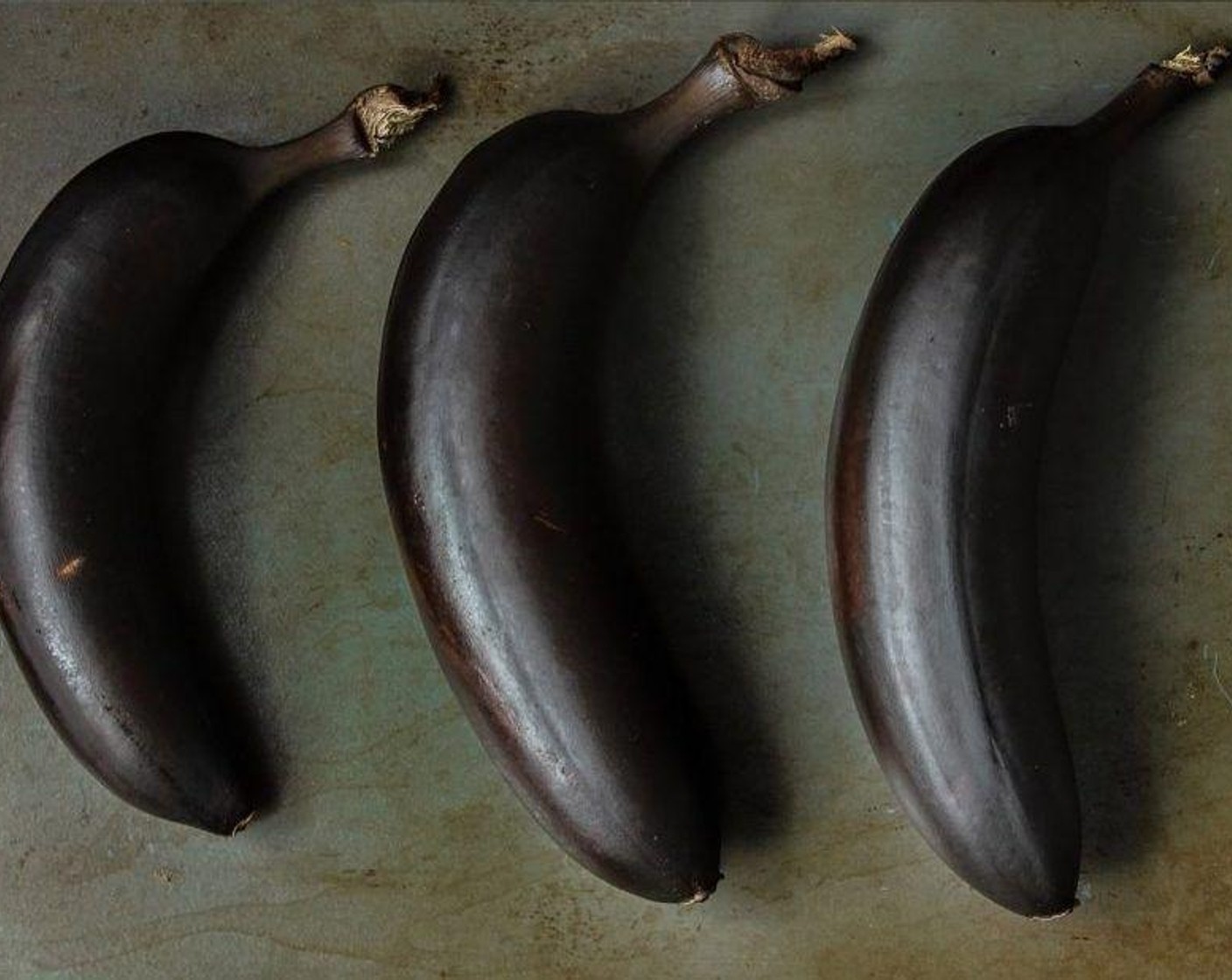 step 3 Bake it for 25-35 minutes. You will know it is done when the skins are black and very shiny and the bananas will look very plump. They occasionally will leak as well.